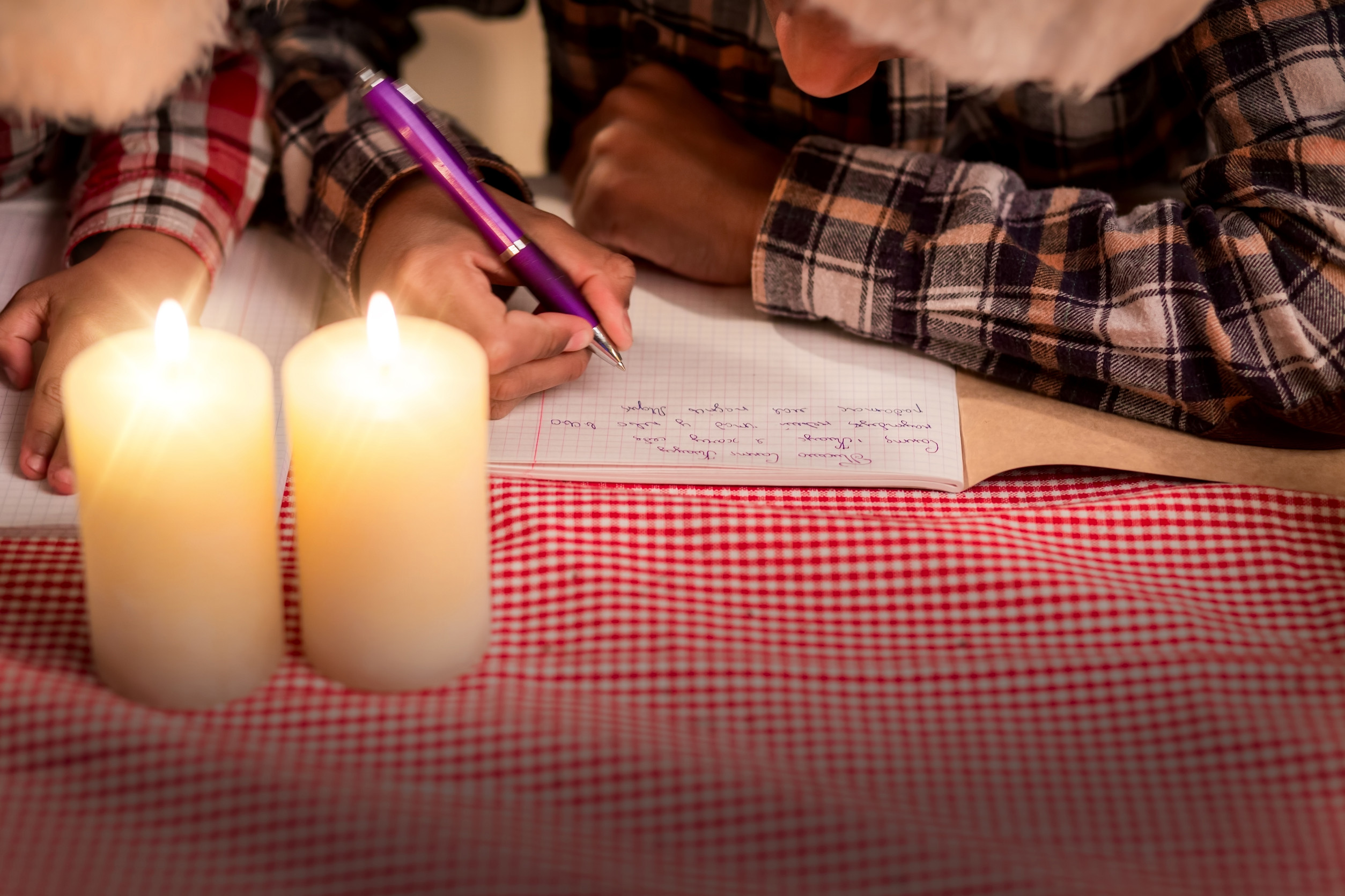 One Porirua family had to use candles to light their home for months after being disconnected from their power. Photo / 123rf