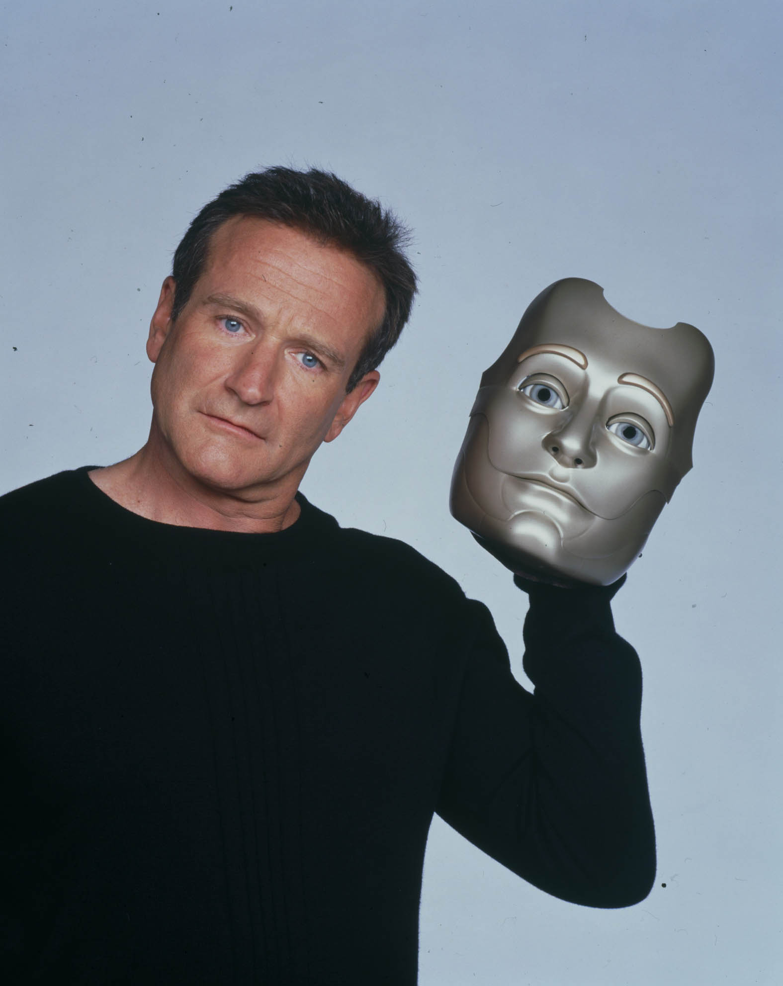 Robin Williams plays a robot who wants to become human in Bicentennial Man, co-starring Sam Neill as the father of the family that acquires him as a household appliance.