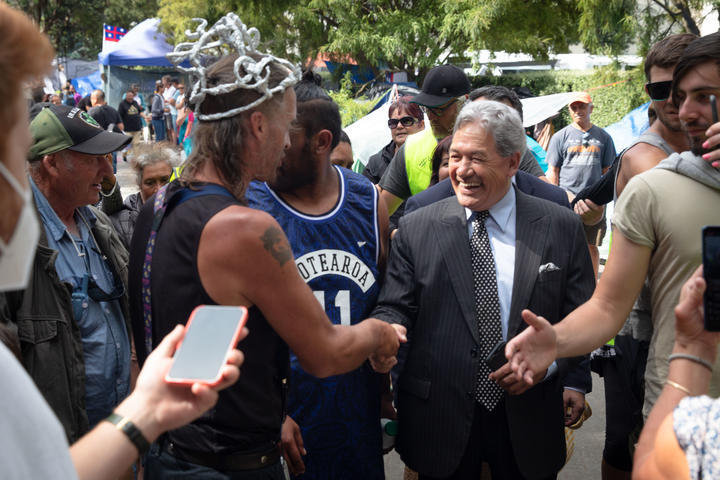 Winston Peters visiting anti-Covid mandate protesters at Parliament last year. Photo / RNZ