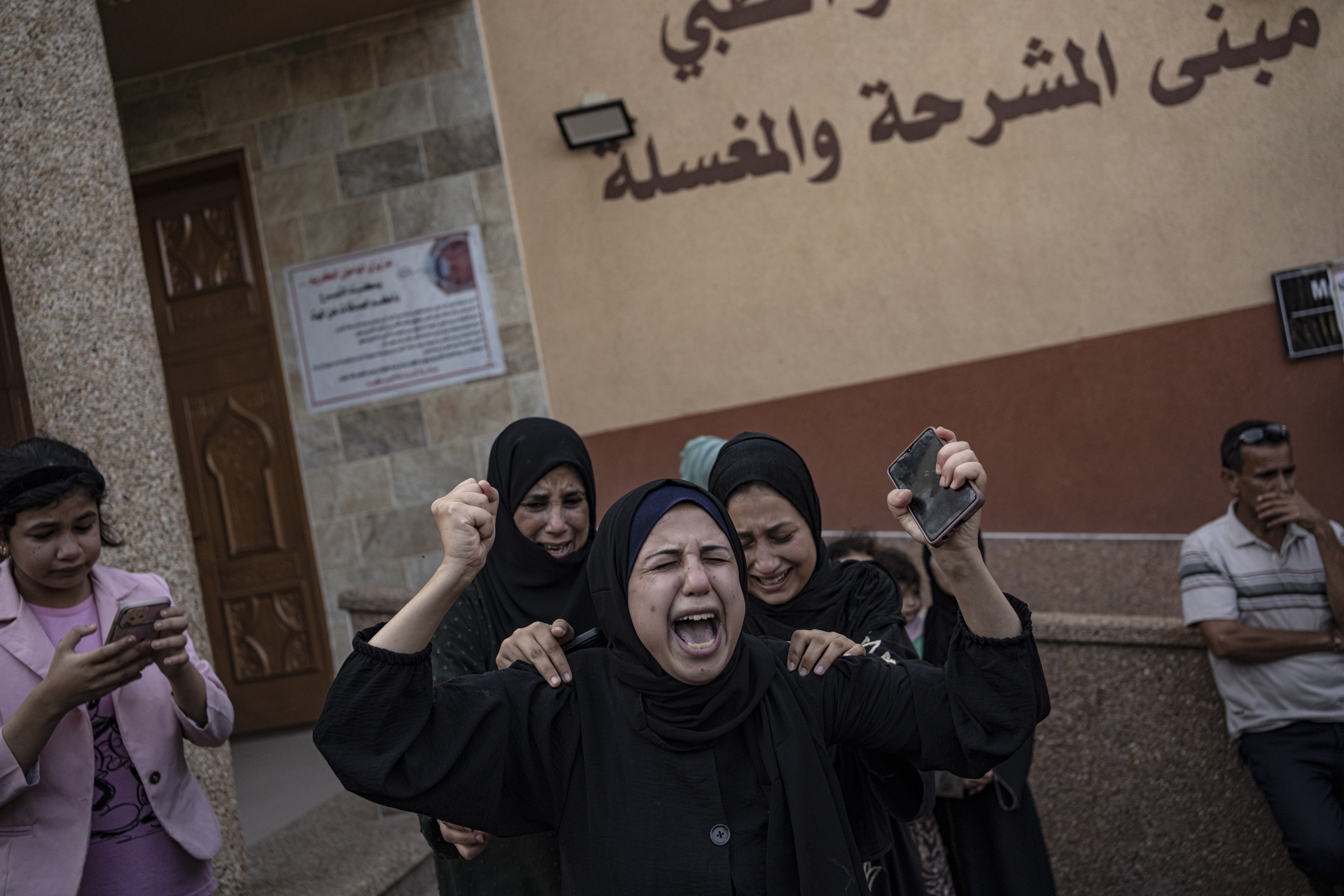 Palestinian women mourn their relatives killed in the Israeli bombardment of the Gaza Strip, in the hospital in Khan Younis, on Saturday, November 11. Photo / AP