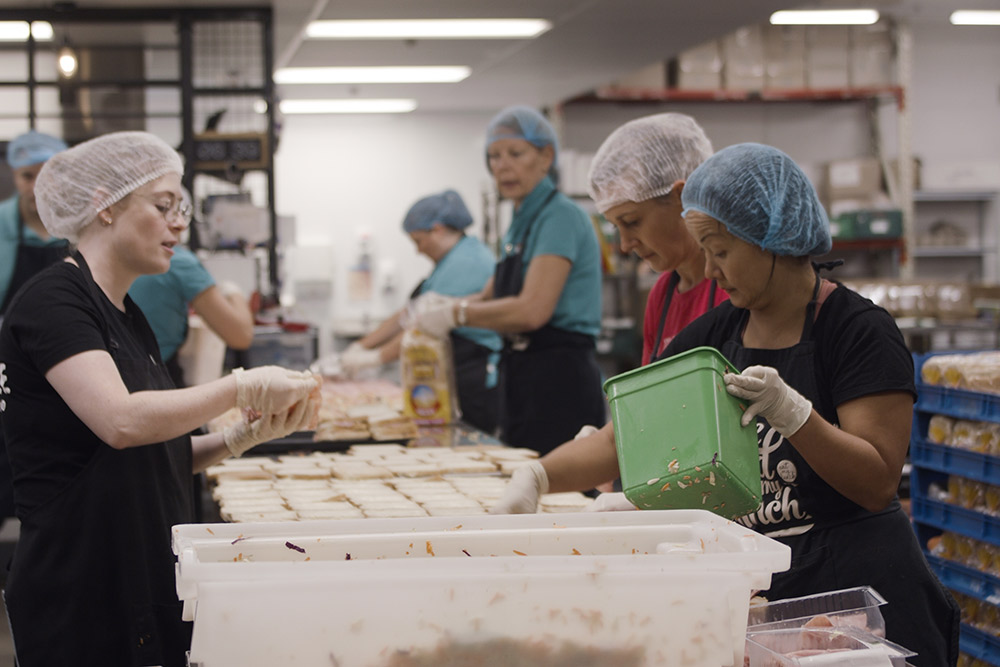 Eat My Lunch rely's on it's dedicated voluntary workers to put the lunches together each morning. Photo / Supplied