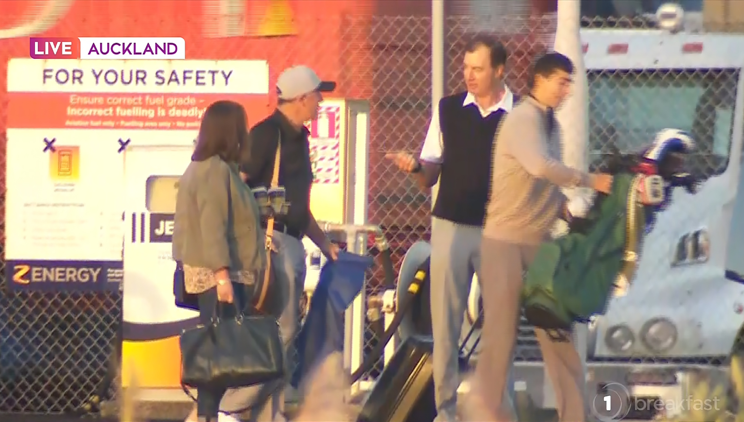 Sir John Key, his wife Bronagh Key and son Max Key board a helicopter at Mechanics Bay bound for a golf course in Northland where Key will play golf with President Barack Obama. Photo / TVNZ