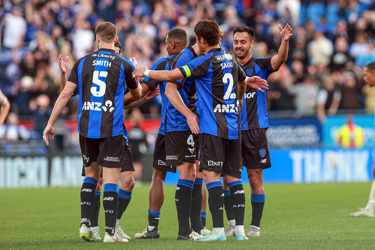 Auckland FC players celebrate. Photo / Shane Wenzlick, Photosport