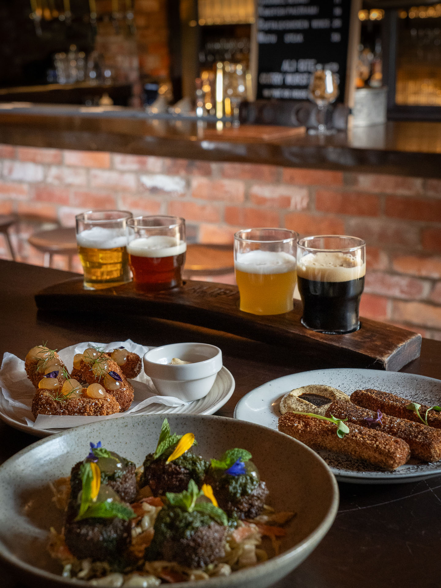 Alibi's tasting paddle and share plates. Photo / Malcolm Campbell