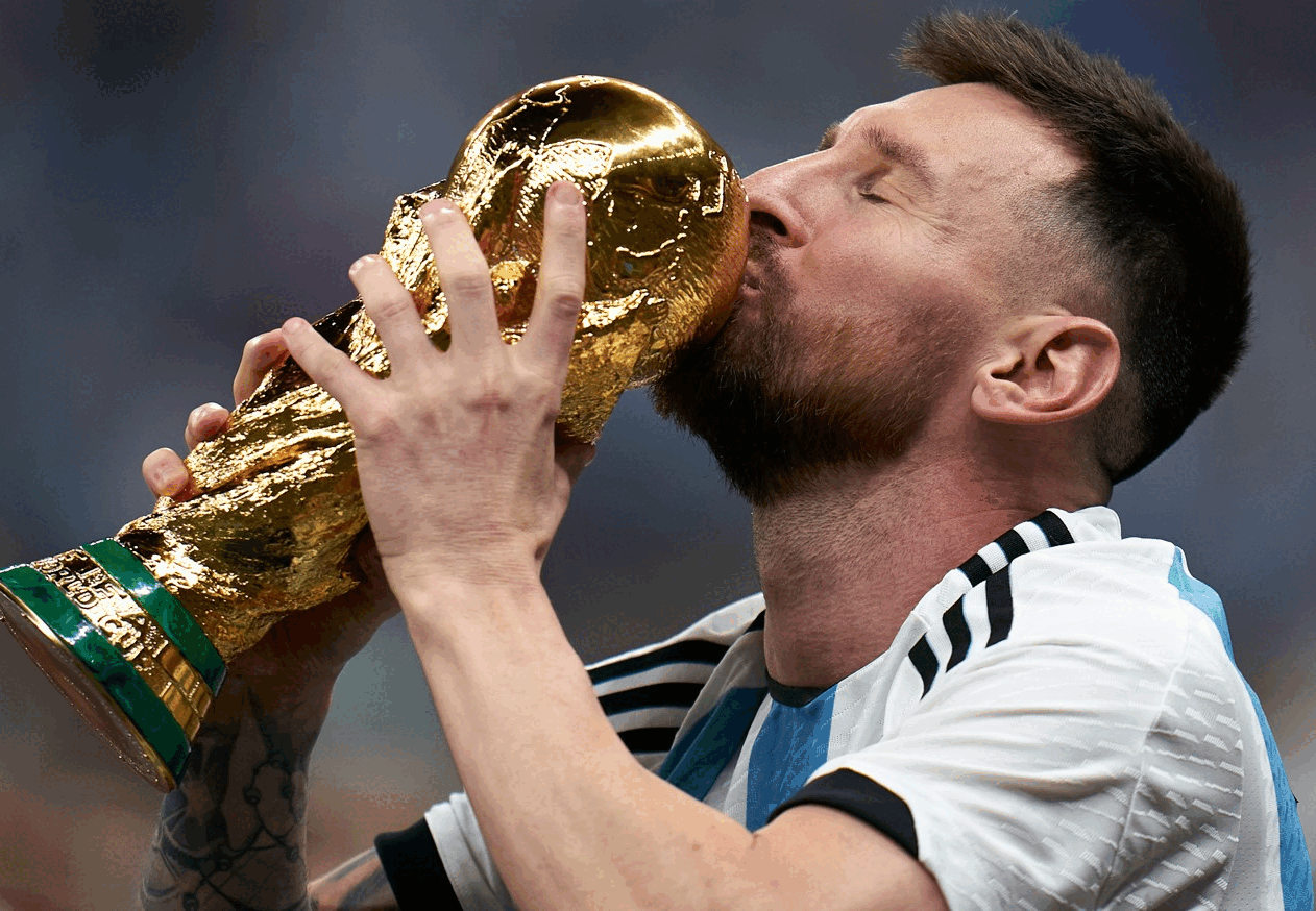 Lionel Messi with the World Cup after Argentina's win in 2022; All Whites star striker Chris Wood. Photos / Getty, Photosport