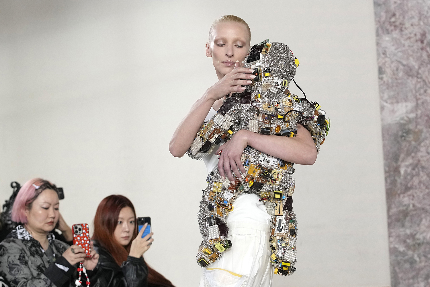 Schiaparelli's robot baby, covered in flip phones, for its haute couture spring/summer 2024 collection presented in Paris. Photo / AP