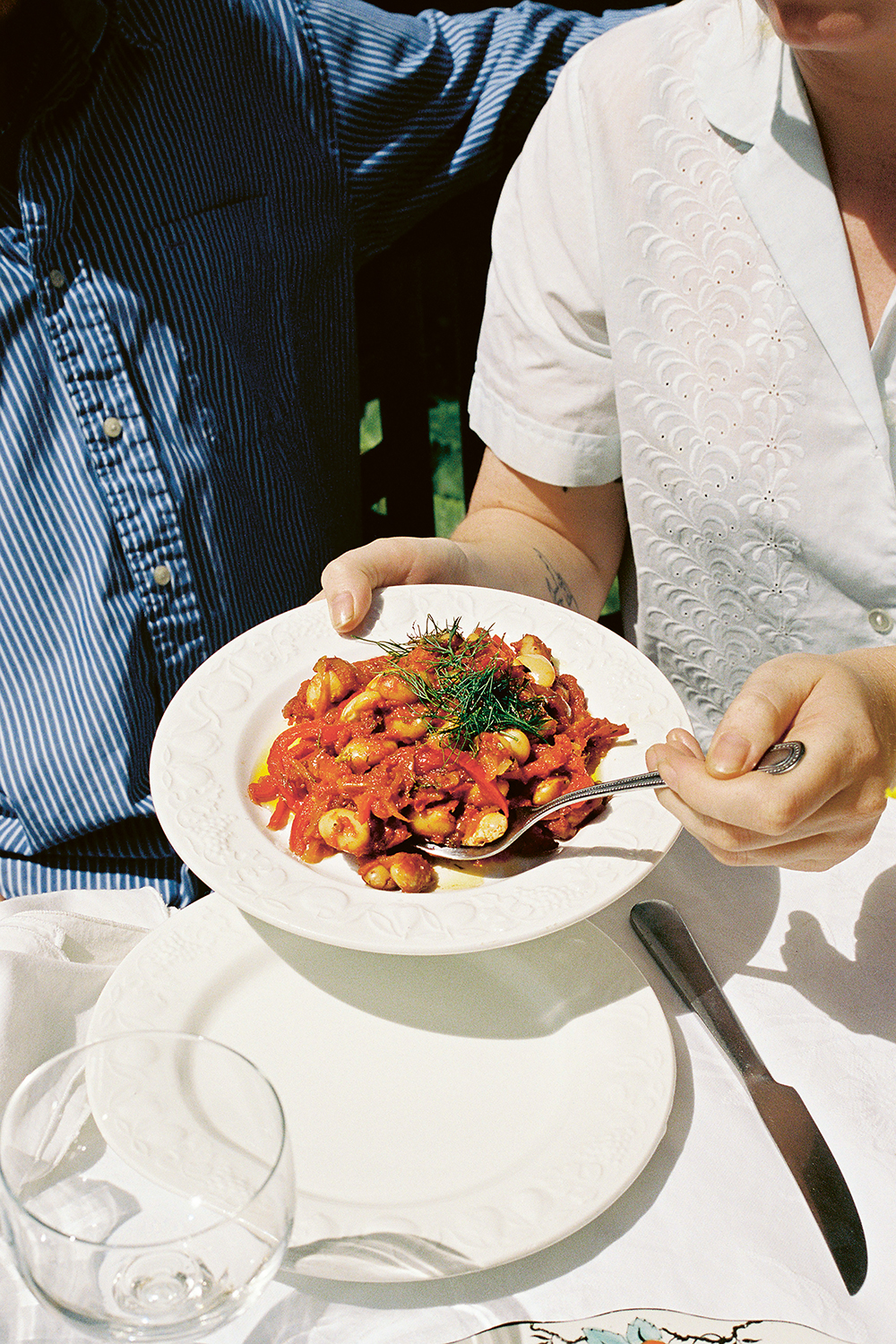 This is a rich, rustic Greek dish and the longer you cook the onions and capsicum, the better these beans will be. Photo / Ella Mittas