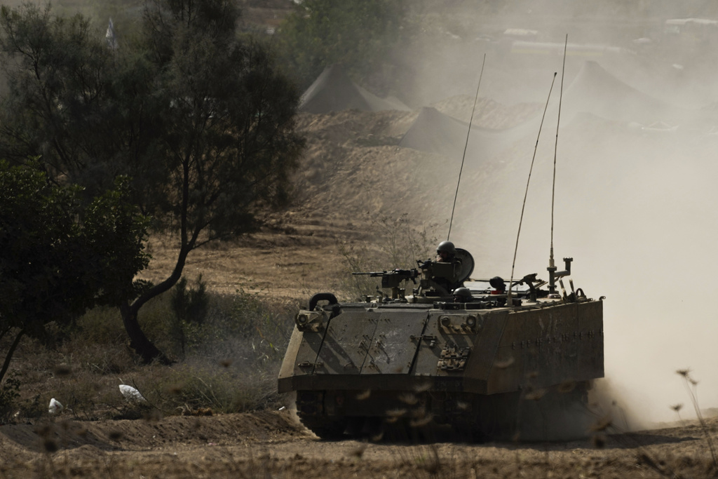 An Israeli armoured personnel carrier moves near the Gaza Strip border, in southern Israel on October 31. Photo / AP