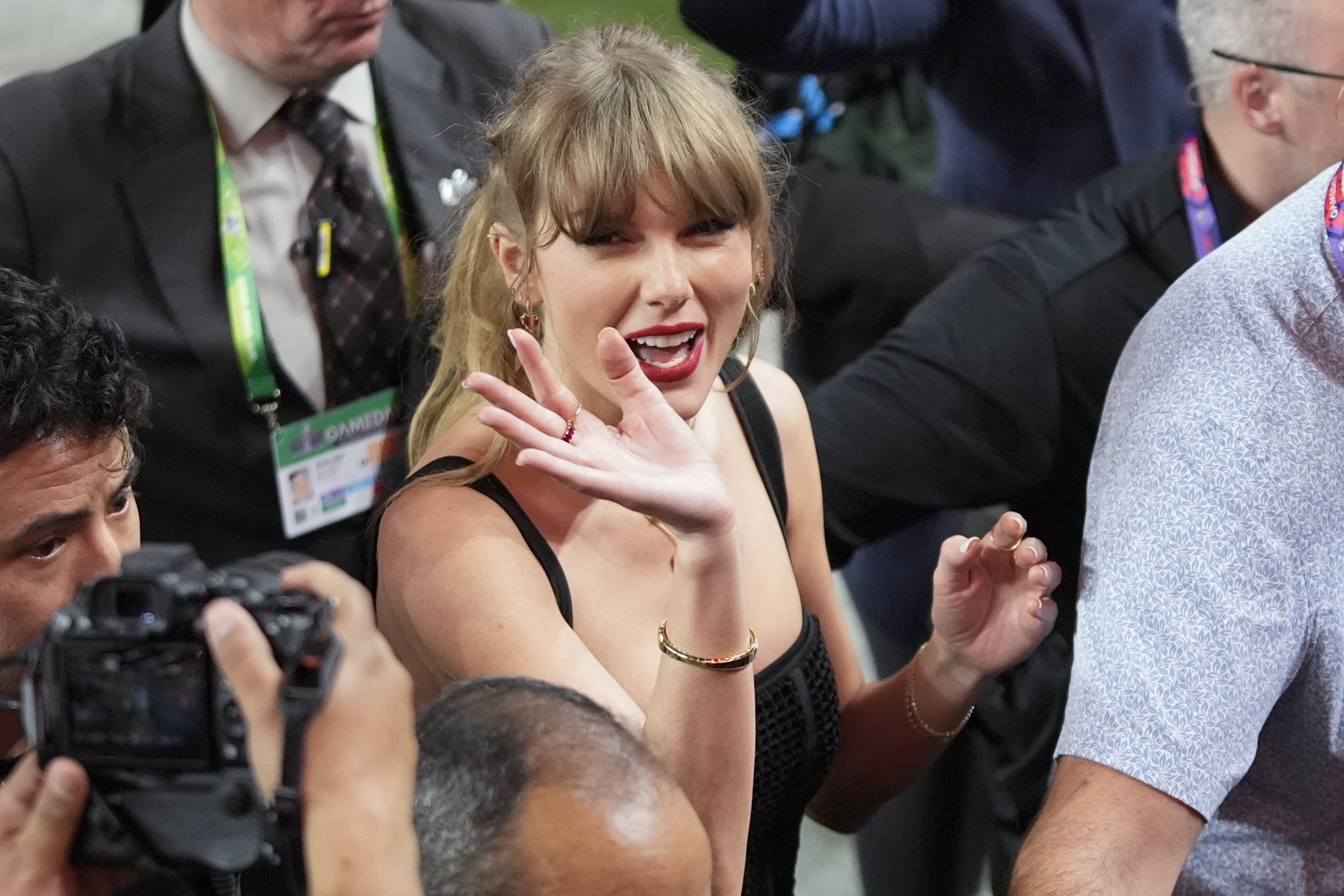 Taylor Swift moves on to the field after the Super Bowl football game between the San Francisco 49ers and the Kansas City Chiefs. Photo / AP