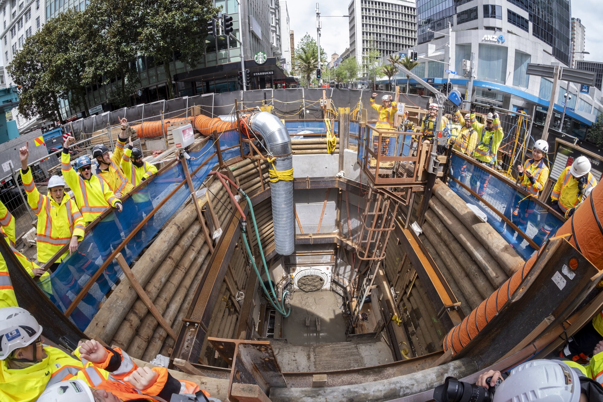 The micro tunnel boring machine breaks through at Victoria St East after laying a new wastewater pipe under Queen St, starting at Mayoral Drive.