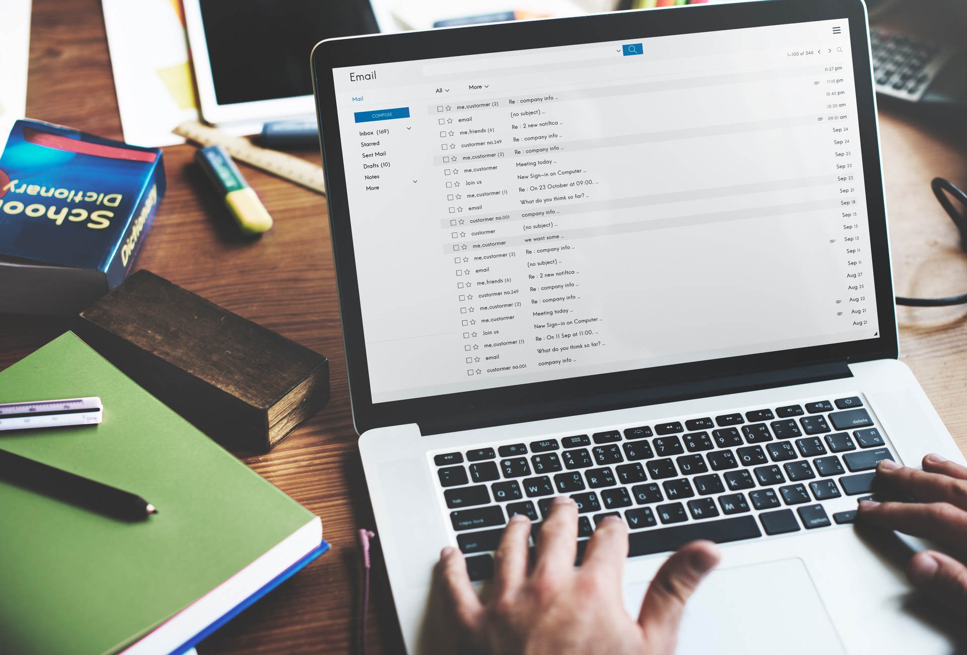 Email inbox displayed on a laptop