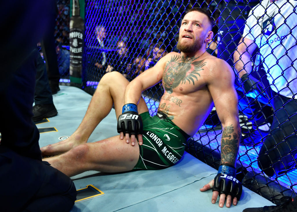 Conor McGregor reacts after his TKO loss due to injury against Dustin Poirier during the UFC 264 event. Photo / Getty