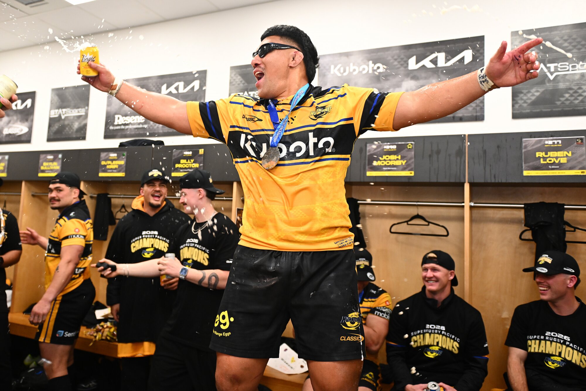 Xavier Numia celebrates with the Hurricanes after winning the 2026 Super Rugby title. Photo / Photosport.