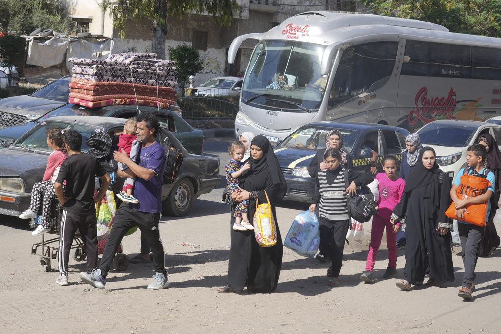 Palestinians flee to the southern Gaza Strip after the Israeli Army issued an evacuation warning. Photo / AP