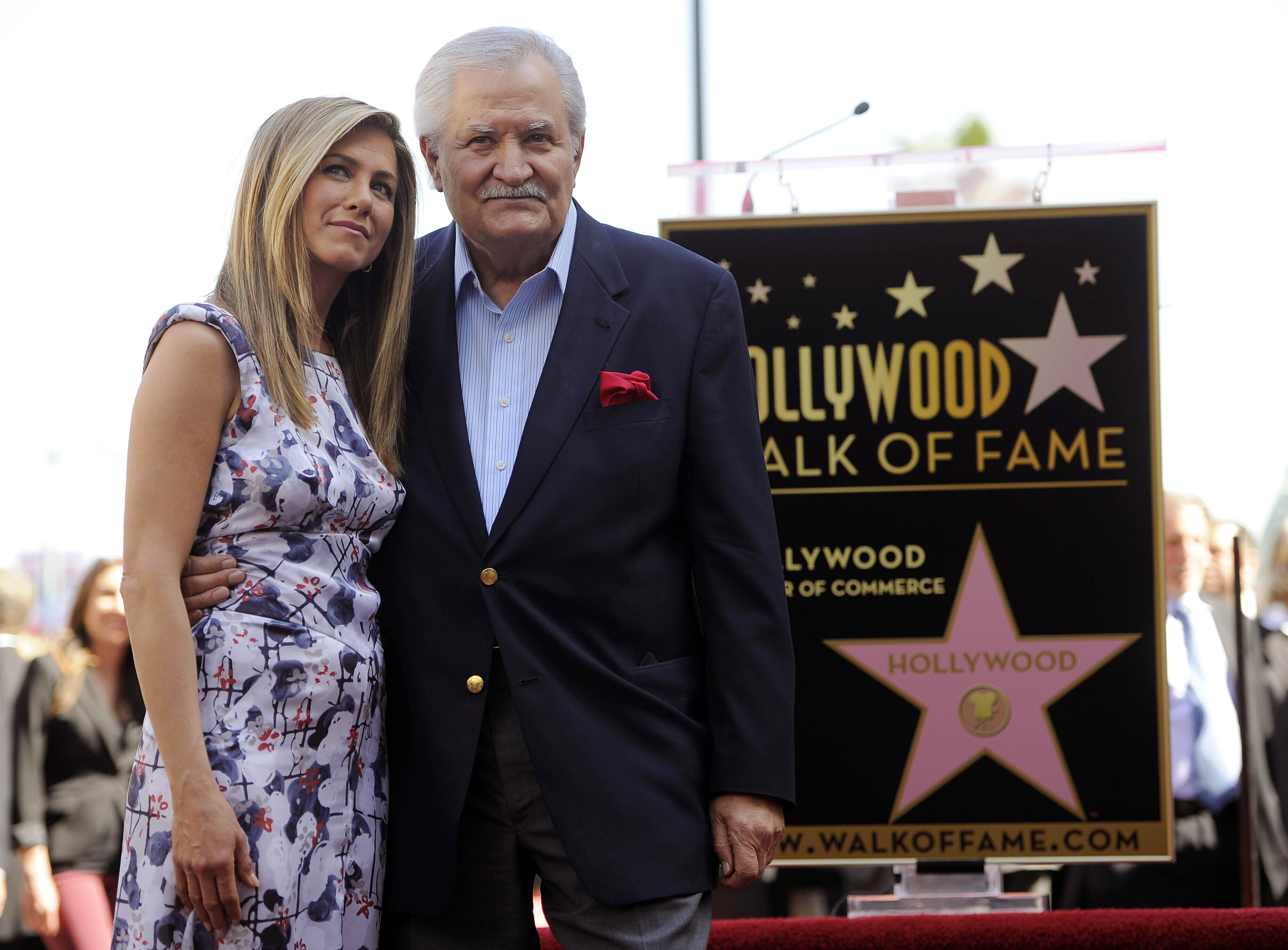 Jennifer Aniston, left, with her father, actor John Aniston, after she received a star on the Hollywood Walk of Fame in Los Angeles in 2012. Photo / Chris Pizzello, AP, File