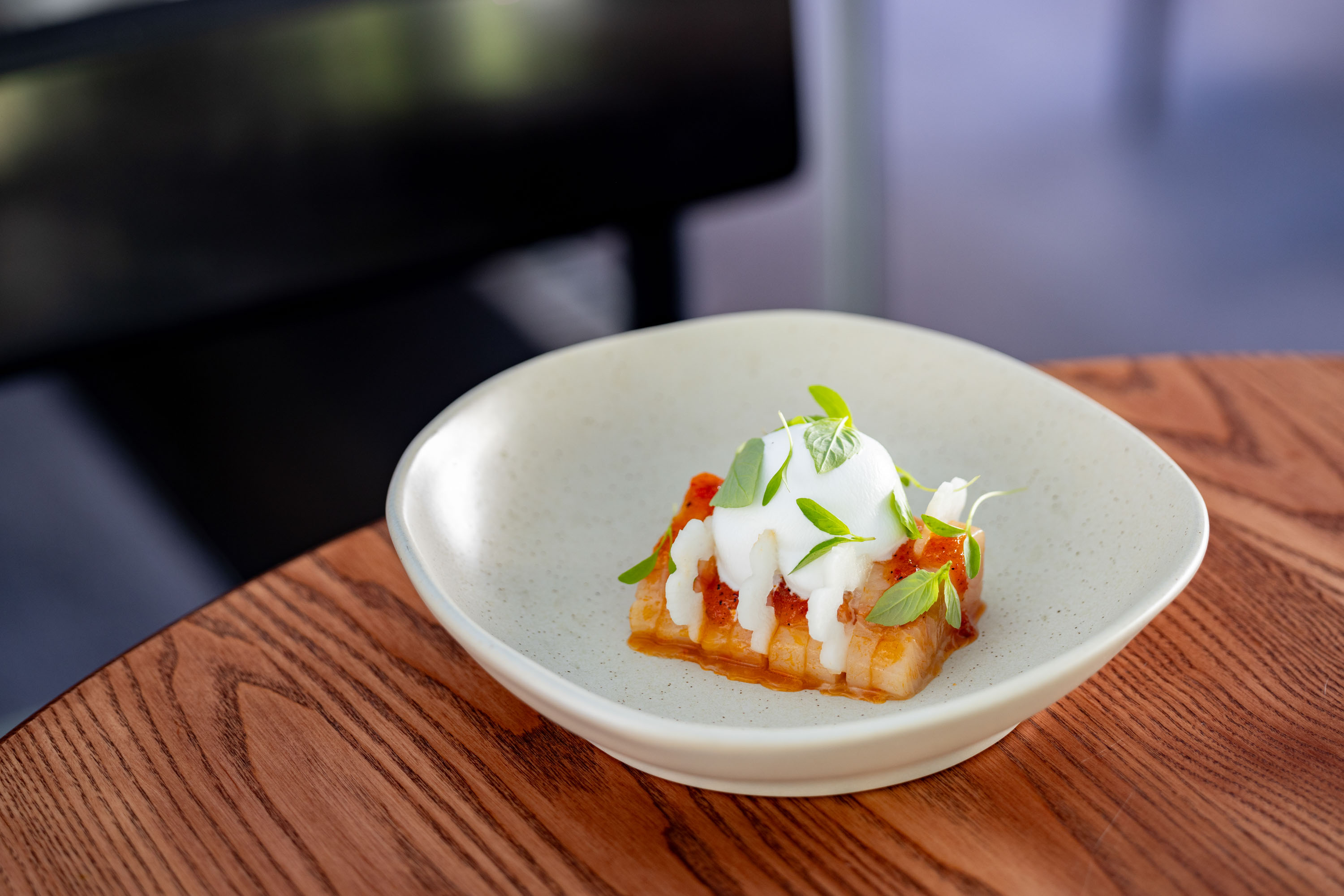 At Anise, the kingfish comes topped with a cold sorbet. Photo / Babiche Martens