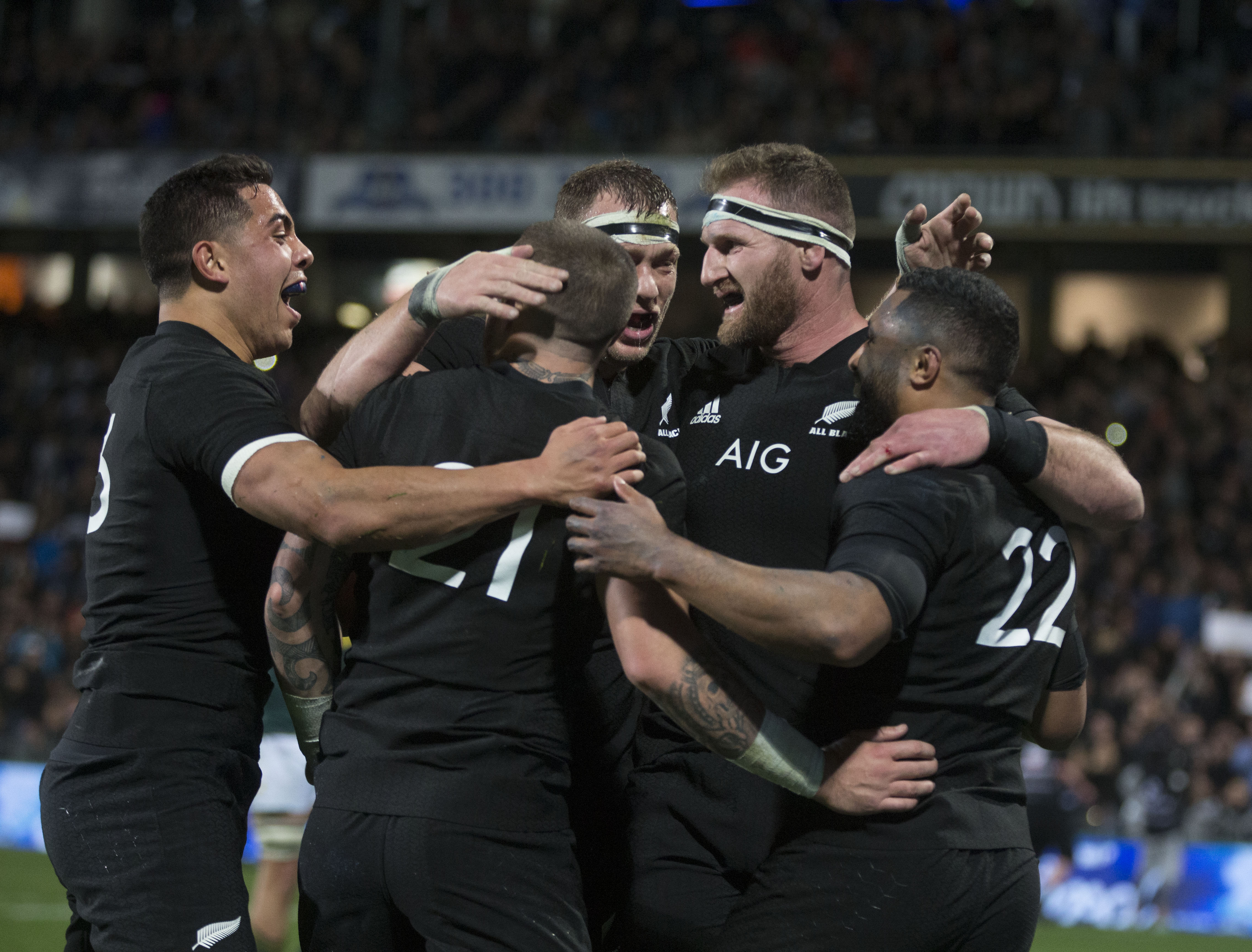 The All Blacks celebrate a try in the 57-0 thrashing of the Springboks. Photo / Brett Phibbs