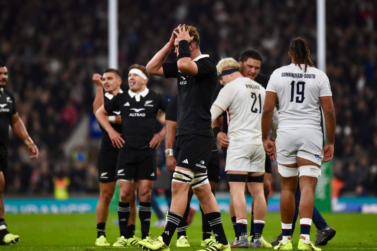 All Blacks players react to defeat to England at Twickenham. Photo / Brad Roberts