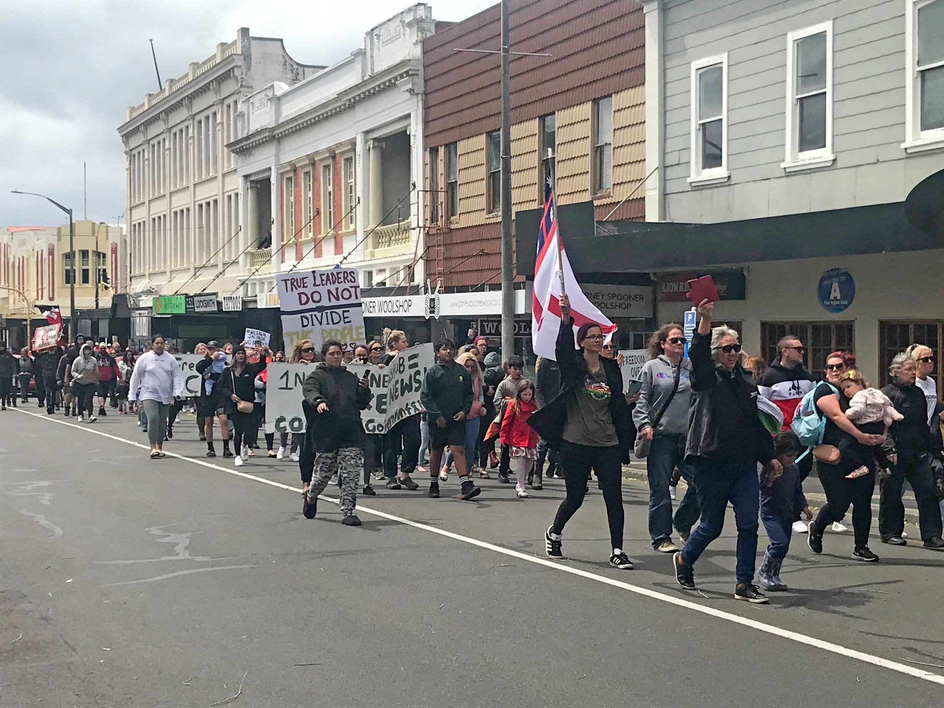 Protesters head down Guyton Street towards the Whanganui District Council building. Photo / Mike Tweed