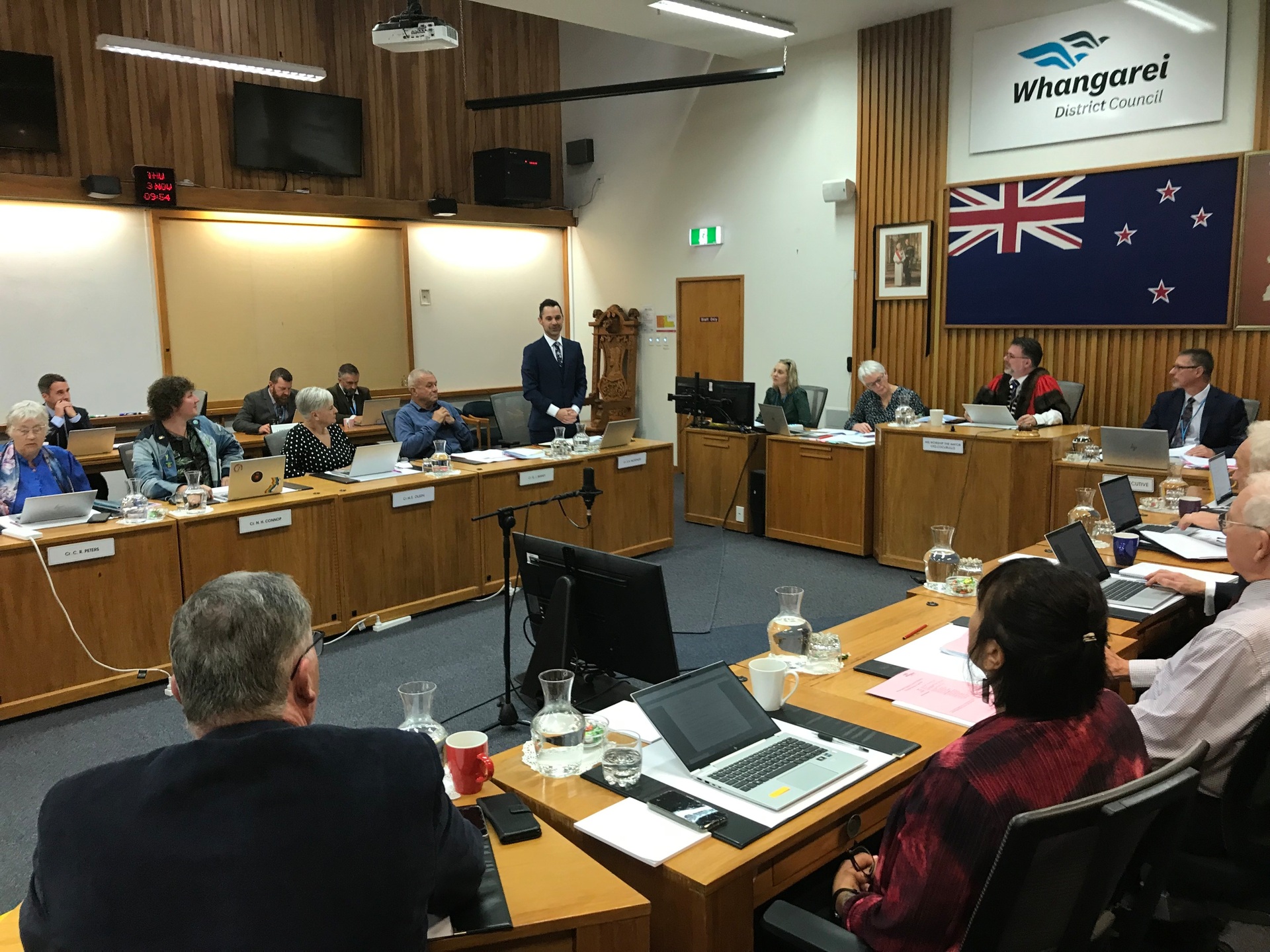 Councillor Scott McKenzie talks to the council meeting after being selected as representative on Northland's major regional joint climate change adaptation committee.  Photo / Susan Botting 
