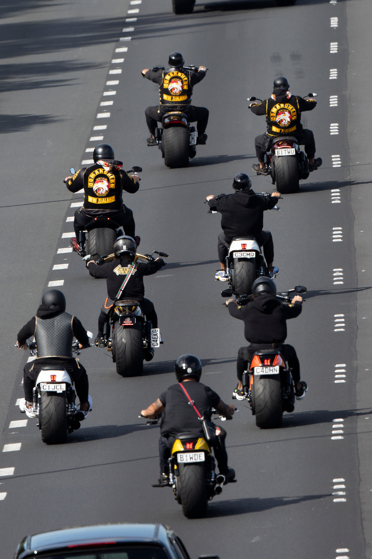 Members of the Comancheros motorcycle gang make their way down the southern motorway just north of Pokeno, Auckland. Photo / Brett Phibbs