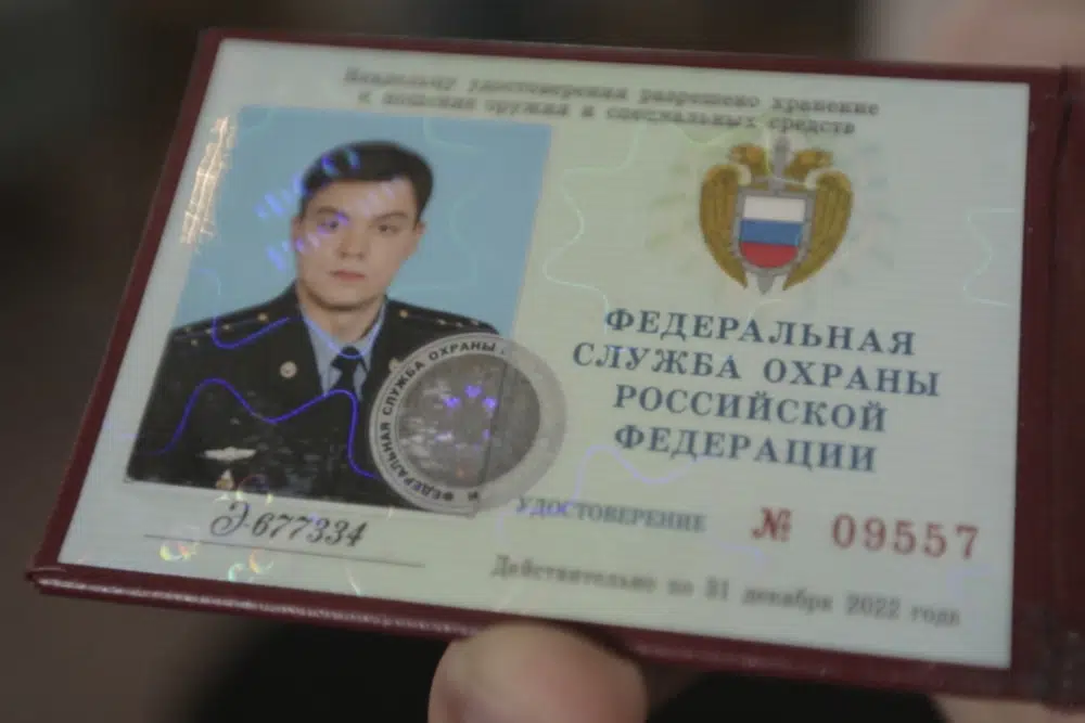 This photo provided by the Dossier Center shows the Russian Federal Protective Service (FSO) identification card of Gleb Karakulov. Photo / AP