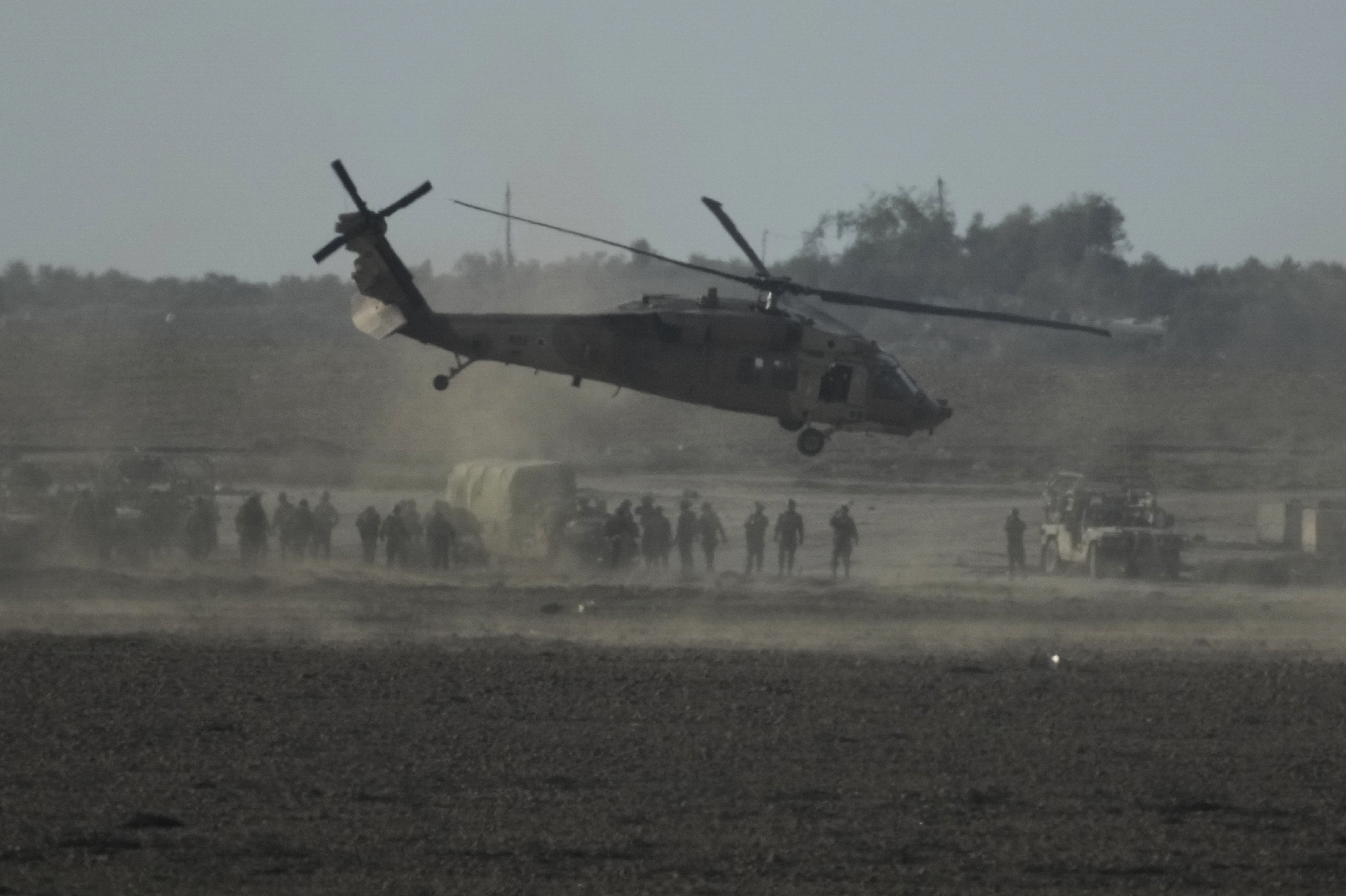 Israeli military helicopter lands near the Gaza Strip border. Photo / AP