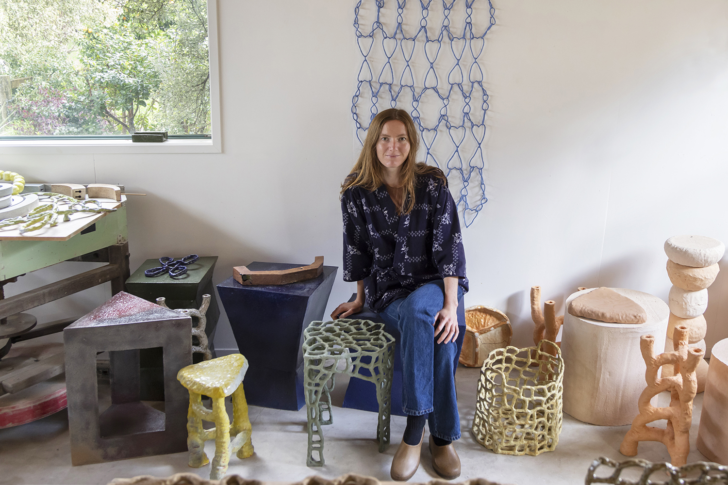 Ceramic artist Jaime Jenkins in her light-filled rural studio surrounded by work in progress for the Aotearoa Art Fair. Photos / Ginny Fisher