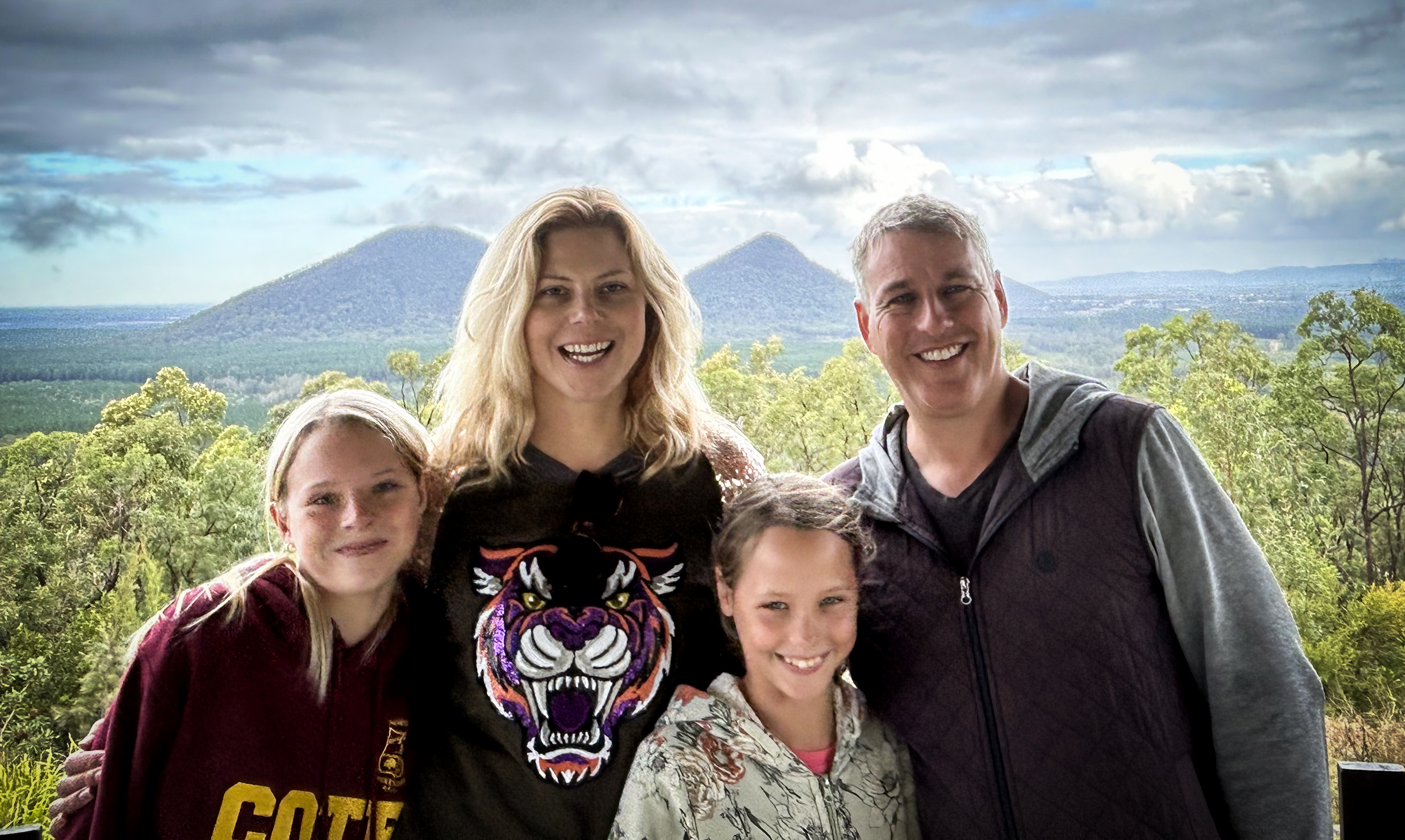 Adrienne Smithson with her husband James and daughters Dominique and Casey (aged 10). 
