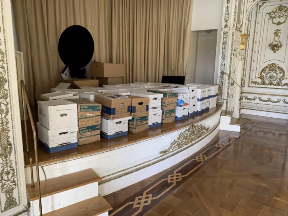 Boxes of records being stored on the stage in the White and Gold Ballroom Photo / AP