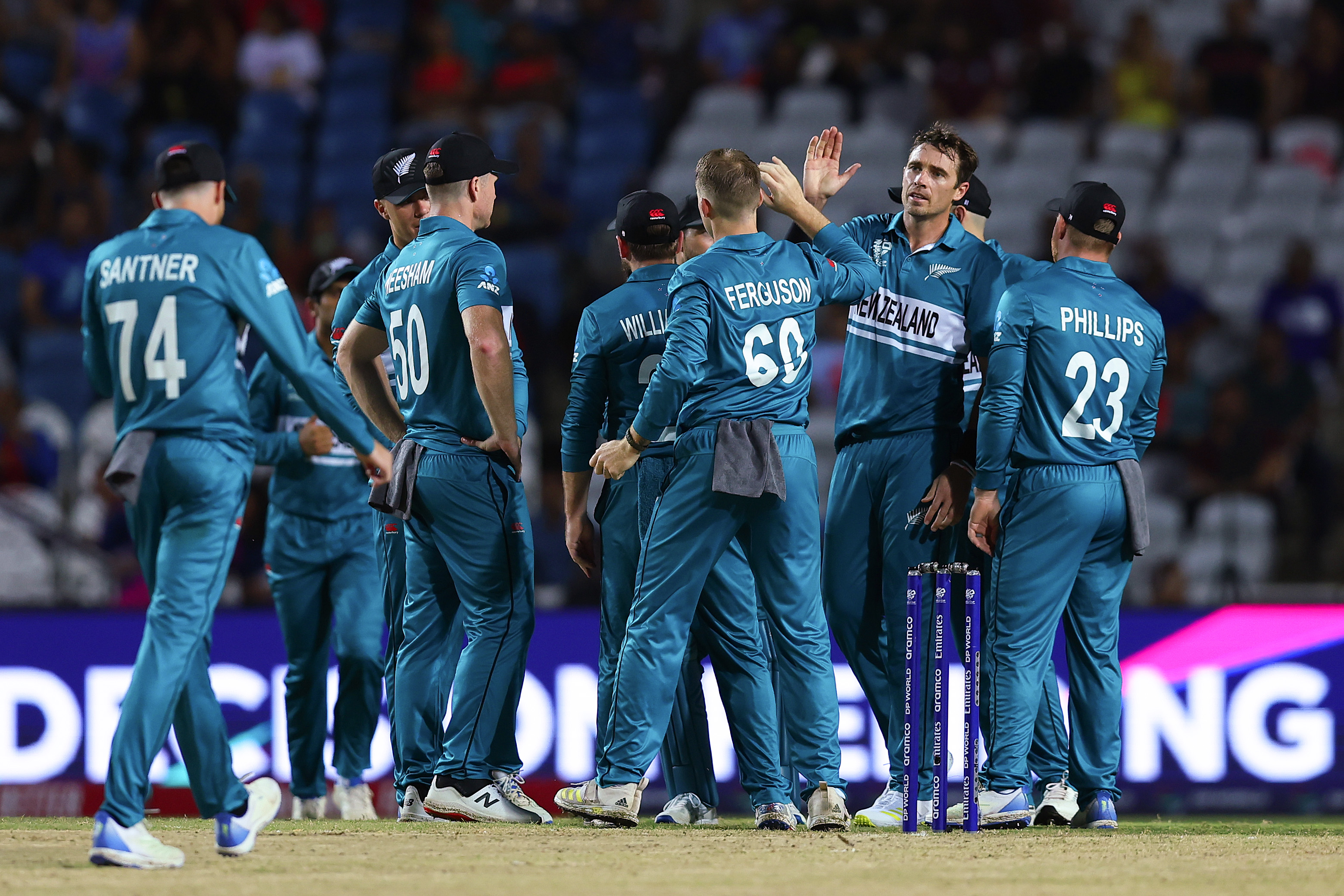 The Black Caps celebrate as Tim Southee takes a wicket against Uganda. Photo / Getty Images