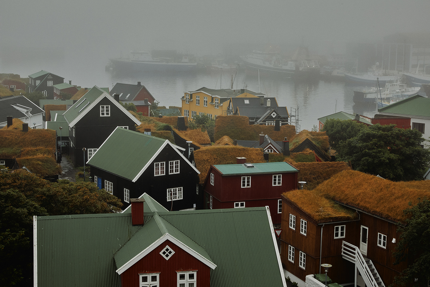 Tórshavn, one of the world’s smallest capitals, has streets lined with wooden buildings, some of them with traditional turf roofs. Photo / David B. Torch, The New York Times