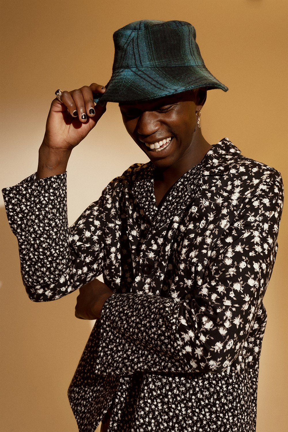 Beach Brains hat, Nom*D jacket, Karen Walker earrings, and Meadowlark ring. Photo / Mia Vinaccia