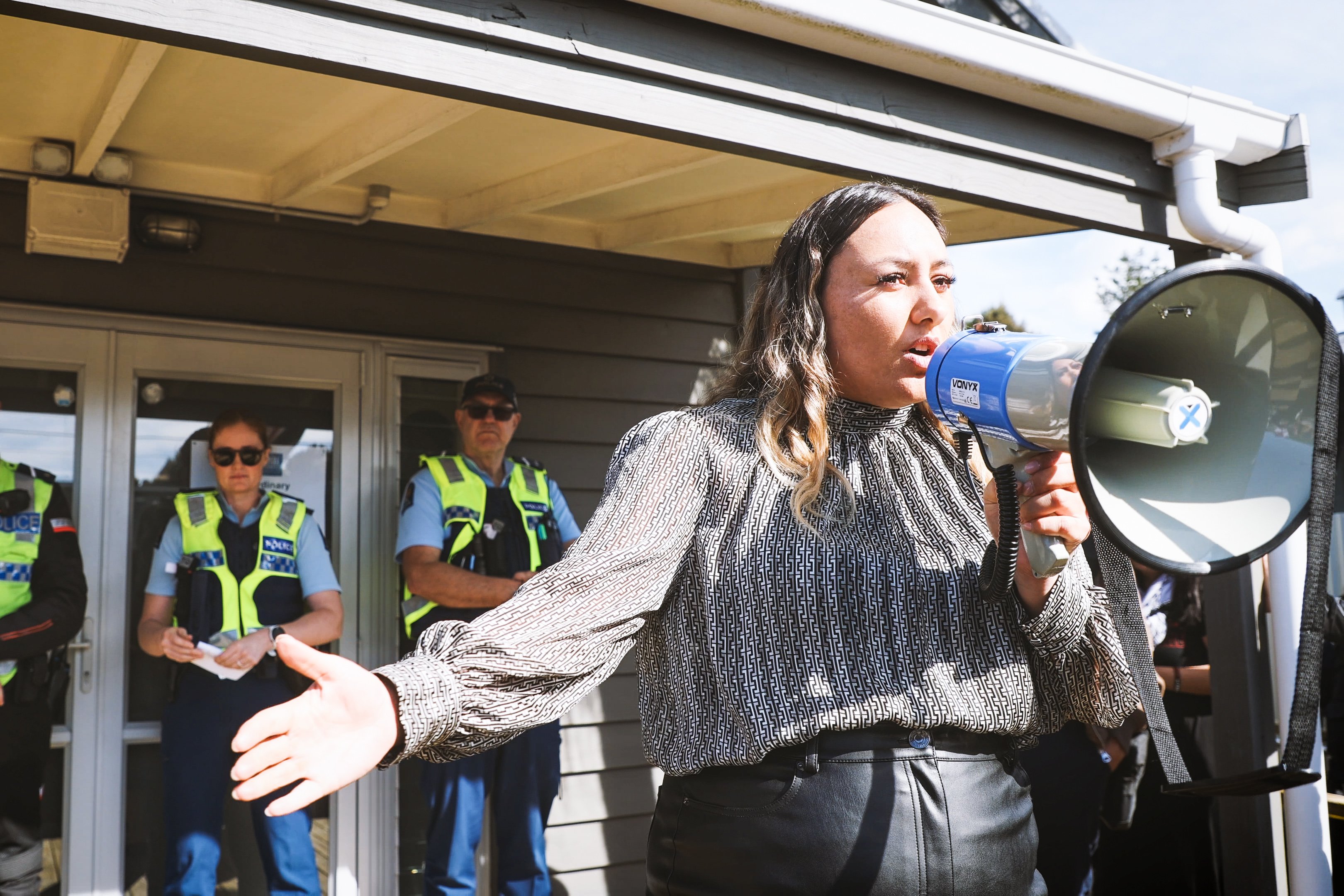 Kaipara Councillor Pera Paniora addressing those gathered outside the Kaipara District Council's meeting on Māori wards. Photo / Michael Craig