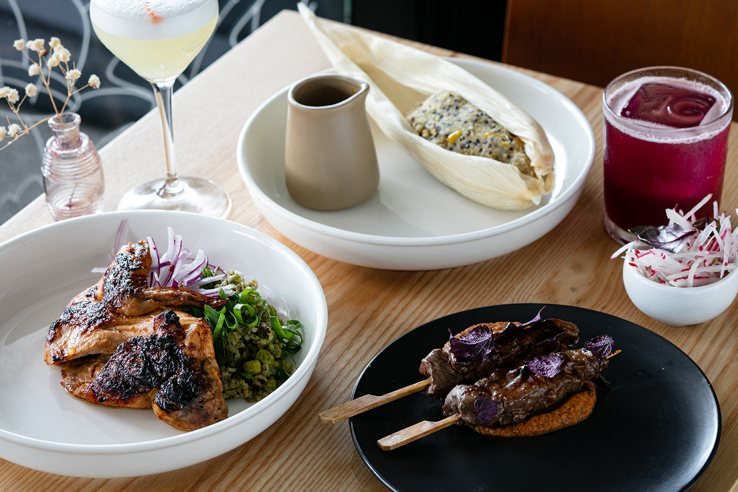 The chicken and the quinoa tamale with beef skewers on the menu at Madame George on K Rd. Photo / Babiche Martens