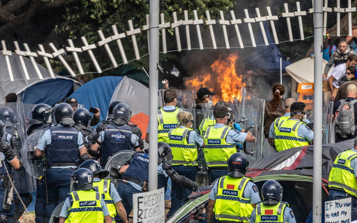 Police clearing Parliament grounds of protesters and tents. Photo / Mike Scott