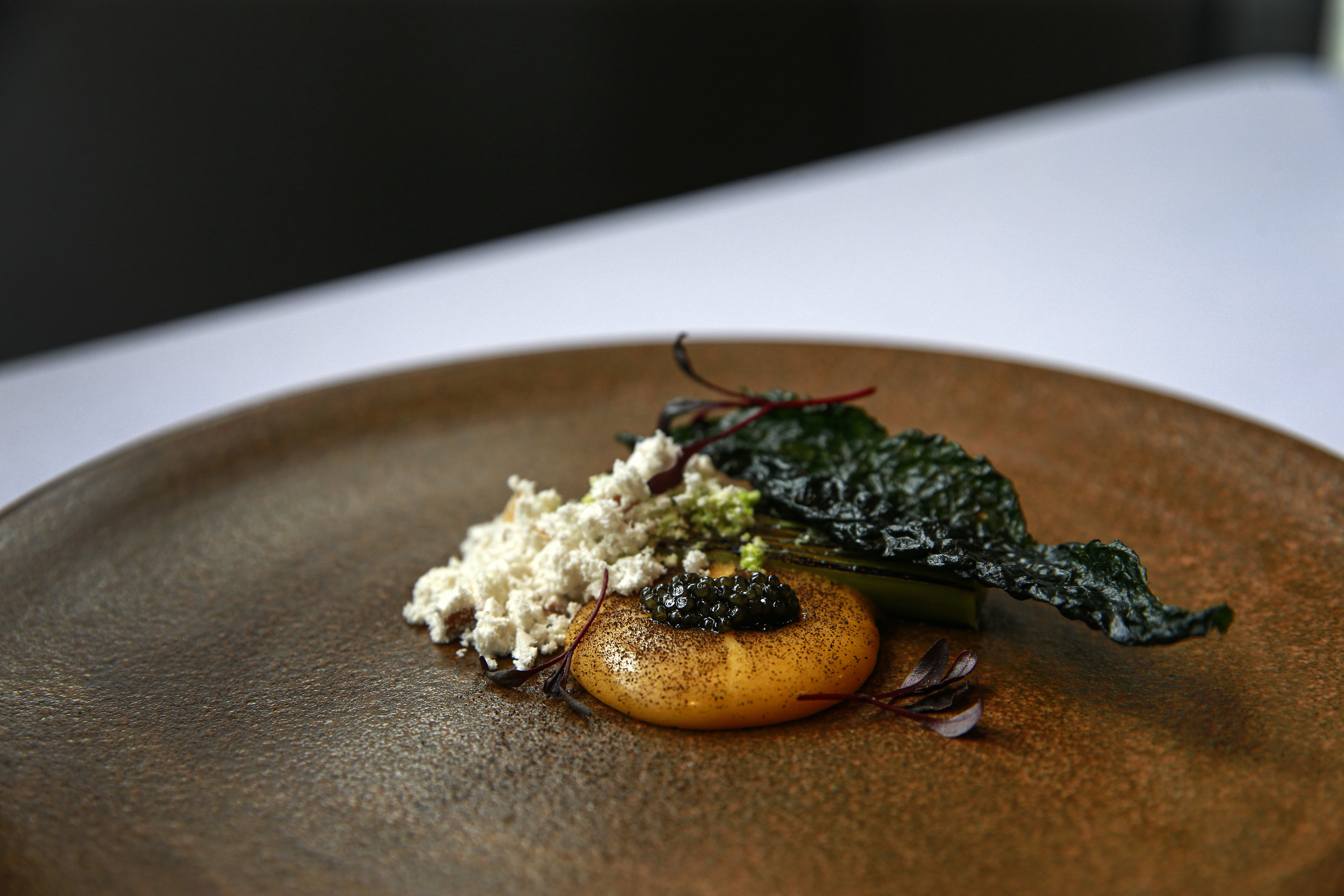 Leek, egg and caviar — one of the six courses served at a $250-a-head caviar dinner at Sidart restaurant. Photo / Alex Burton 