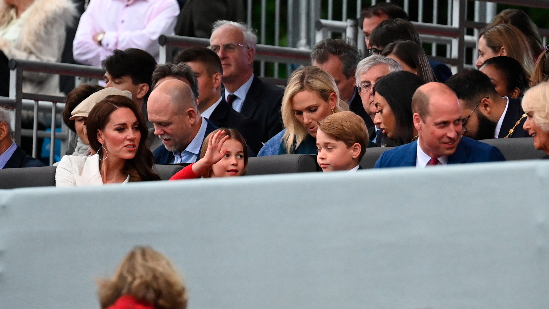 Kate, Duchess of Cambridge, Princess Charlotte, Prince George, Prince William and Camilla Duchess of Cornwall watch the Platinum Jubilee concert with Mike and Zara Tindall seated behind. Photo / AP