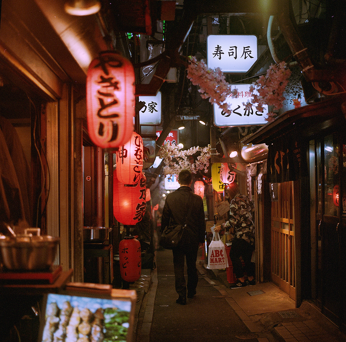 A typical restaurant-filled alleyway in Golden Gai. Photo / Getty Images
