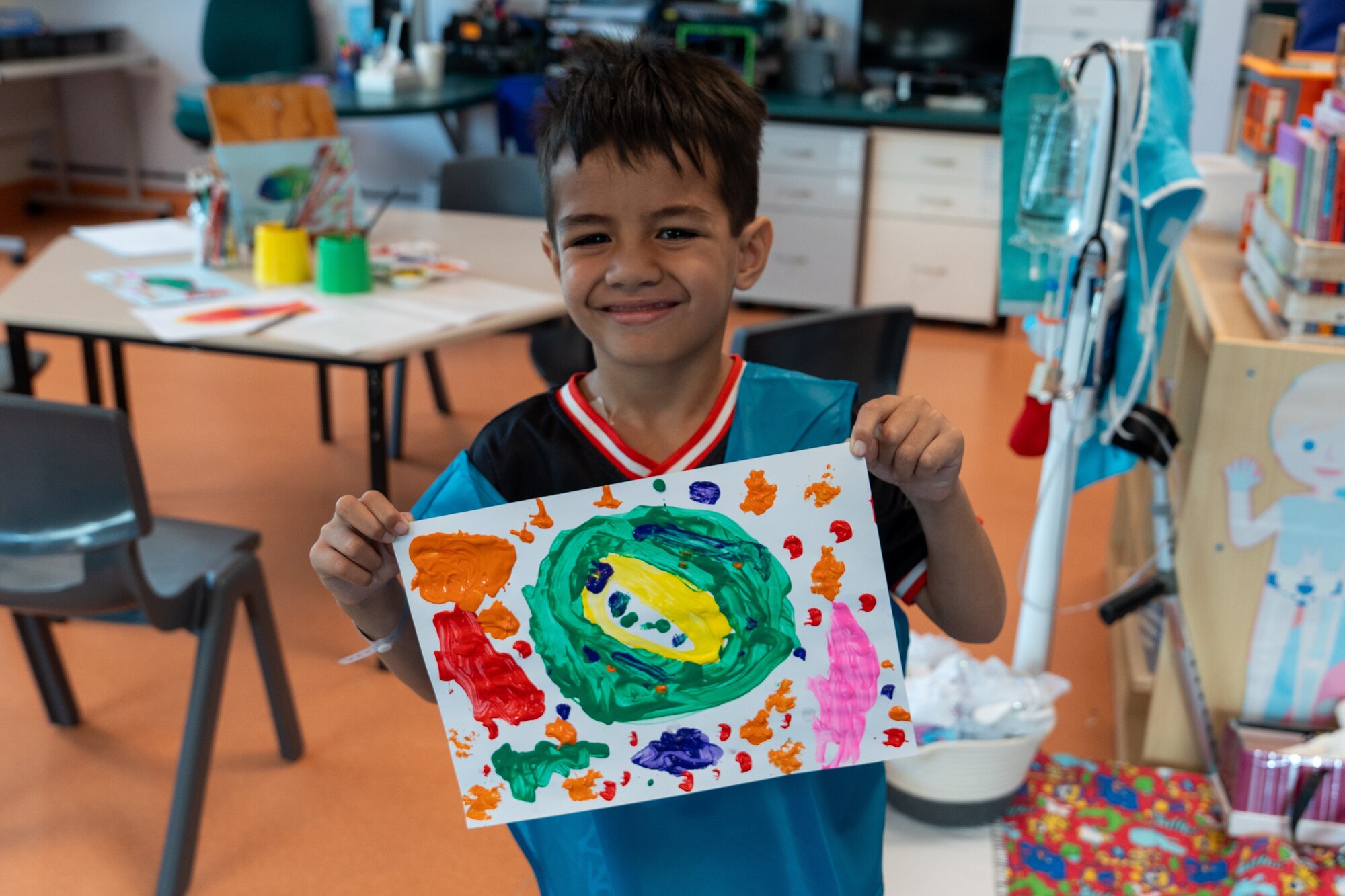 Five-year-old Amias Fitimase showing off his colouring while at Kidz First Hospital. Photo / Annaleise Shortland
