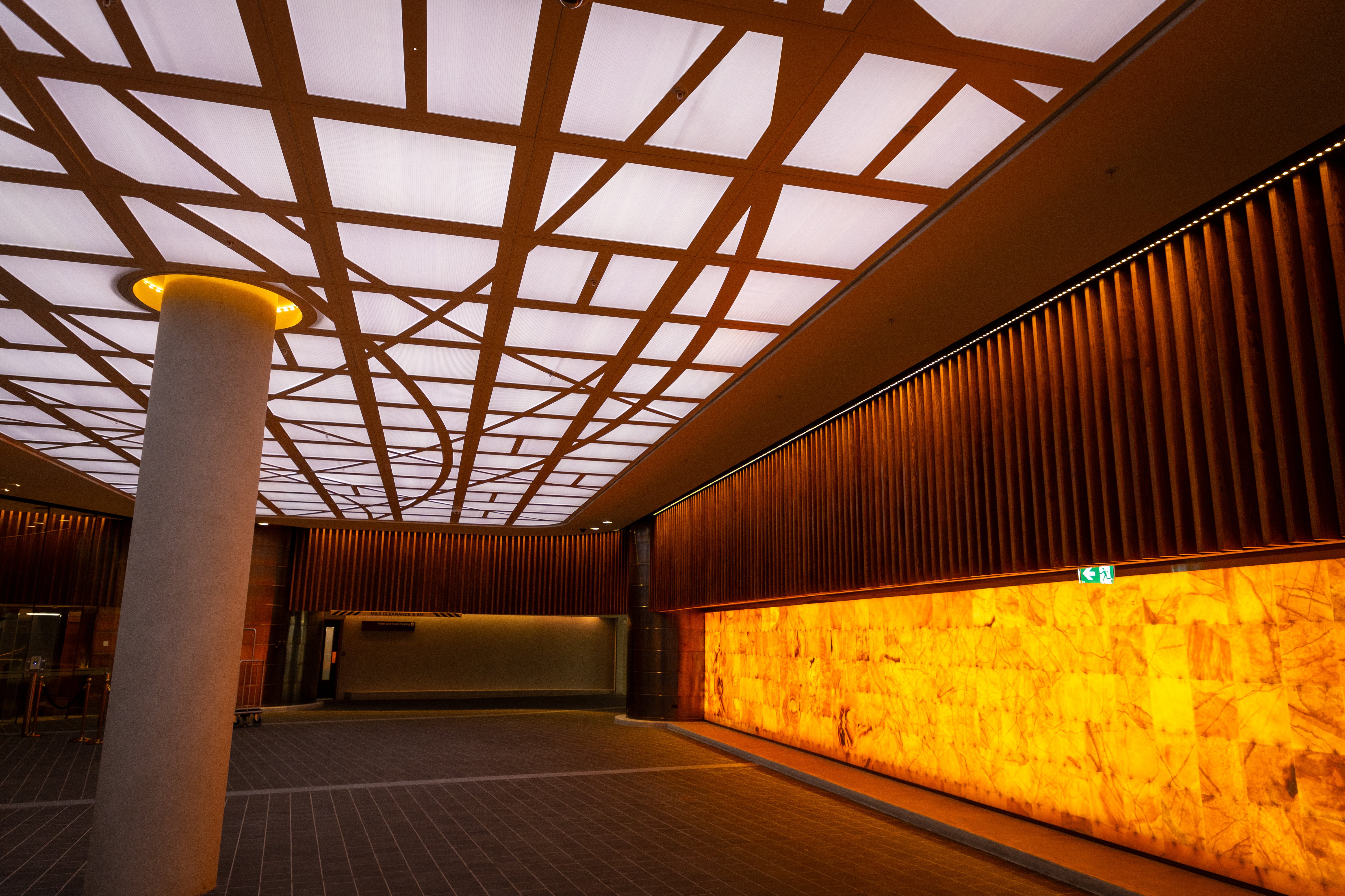 Gordon Moller's porte cochere ceiling along with the 30m long honey onyx tile wall in the new Horizon by SkyCity. Photo / Michael Craig
