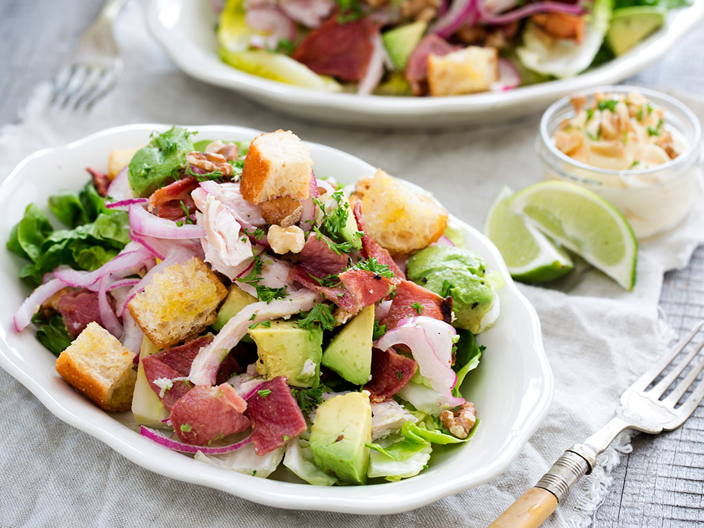 Smoked chicken, avocado, bacon and walnut salad. Picture / Babiche Martens.
