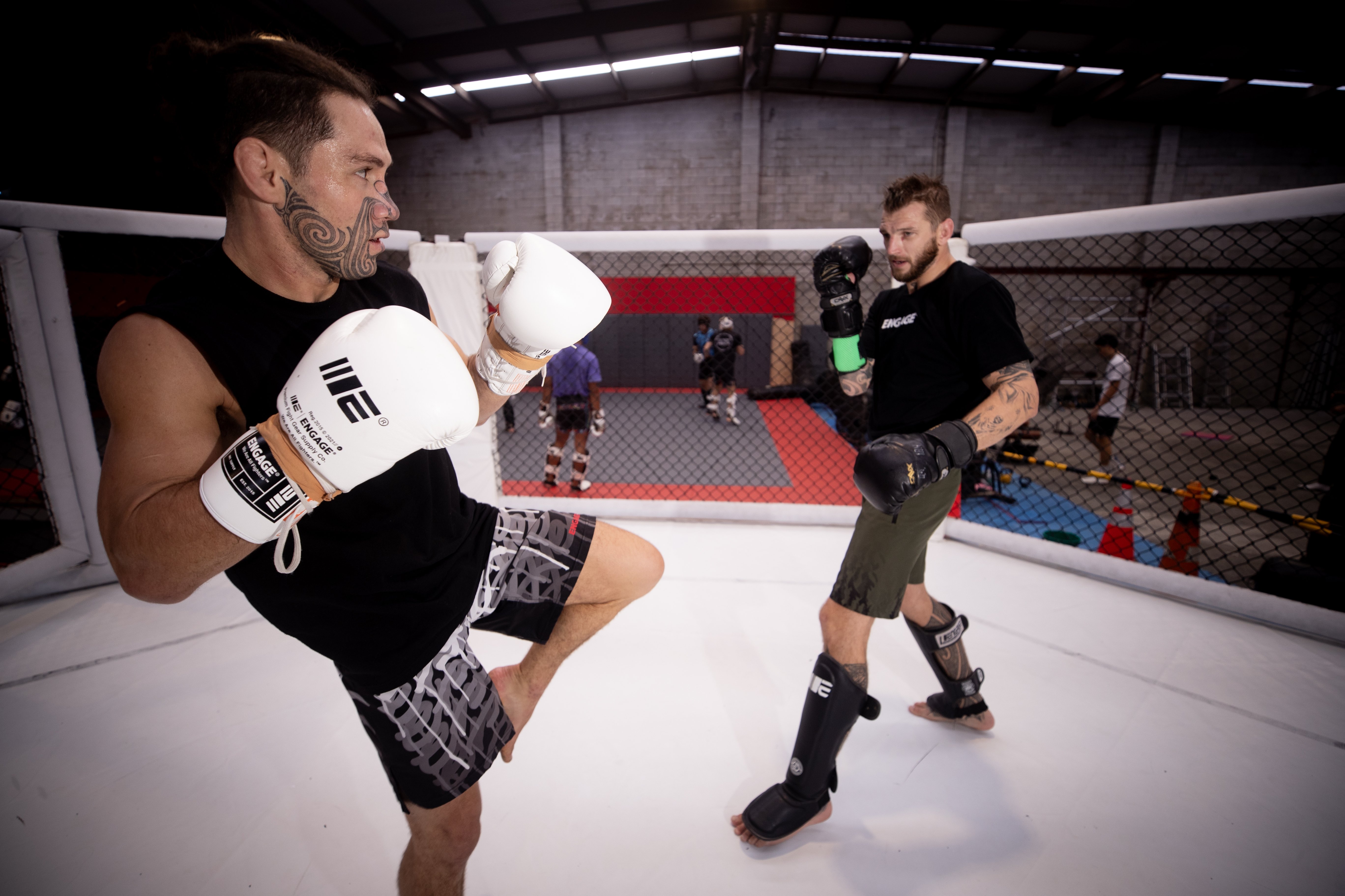Dan Hooker (right) trains with Aaron Tau at Auckland's City Kickboxing. Tau is scheduled to fight for a UFC contract on Dana White's Contender Series next month. Photo / Dean Purcell