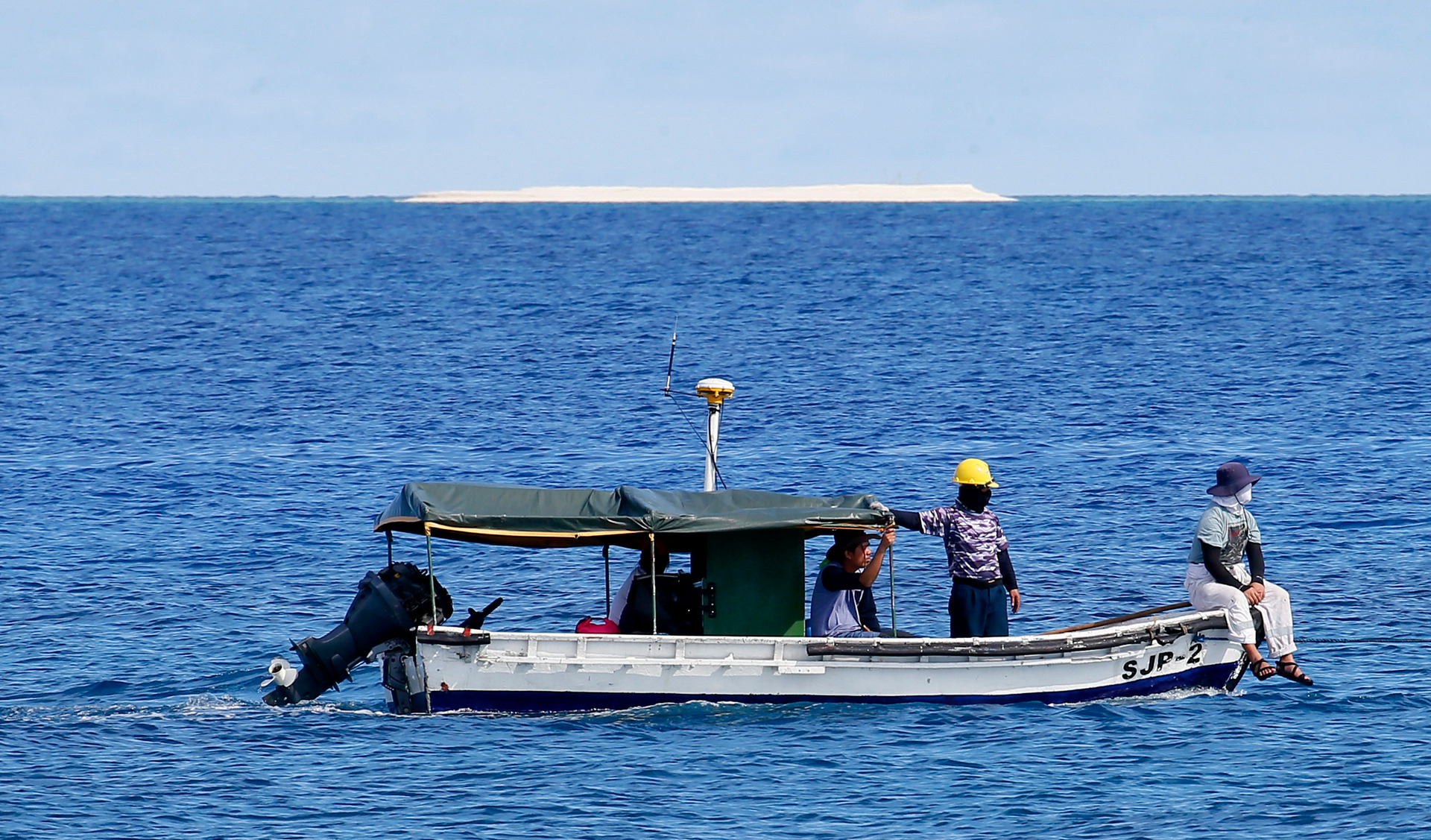 In this 2017 file photo, engineers from NAMRIA, the central mapping agency of the Philippine Government, survey the area around the Philippine-claimed Thitu Island. Photo / AP
