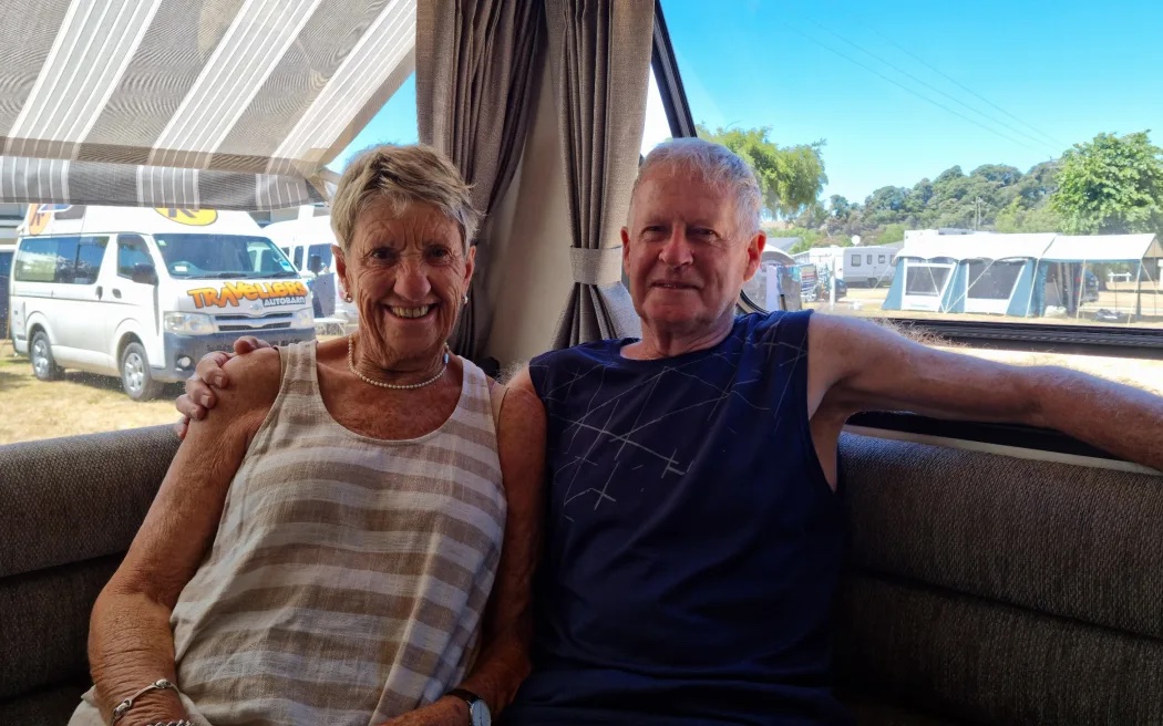 Julie and Allan from Christchurch have been camping at Kaiteriteri for almost 40 years. Photo / Samantha Gee, RNZ