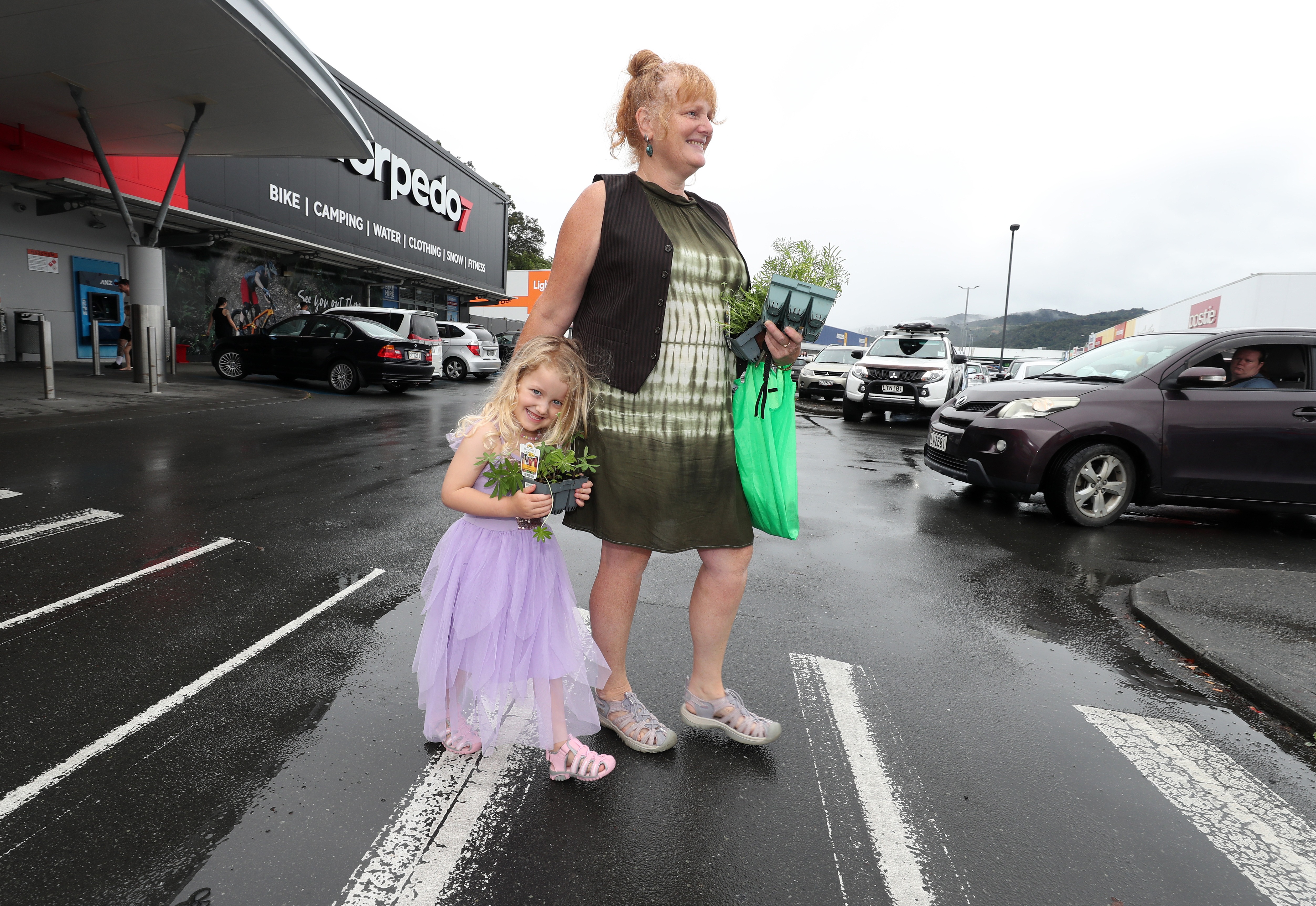 Carol Wise with her bargains and granddaughter Lily Wise sporting her new well-fitting sandals. Photo / Michael Cunningham