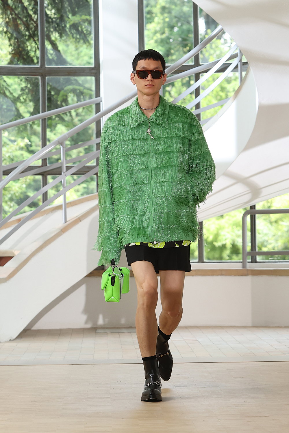 The Gucci men's show was full of saturated colour and crisp designs.