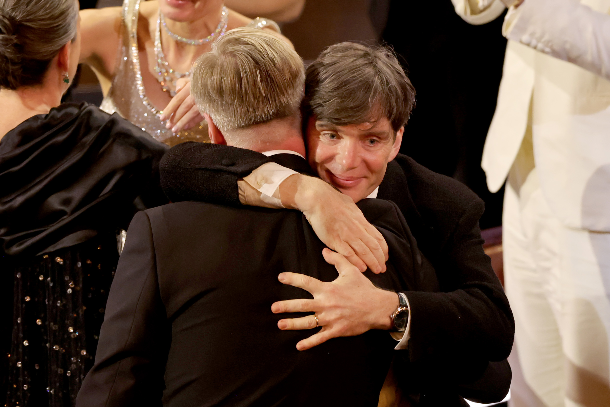 Christopher Nolan and Cillian Murphy hug after winning Best Picture award for Oppenheimer. Photo / Getty Images