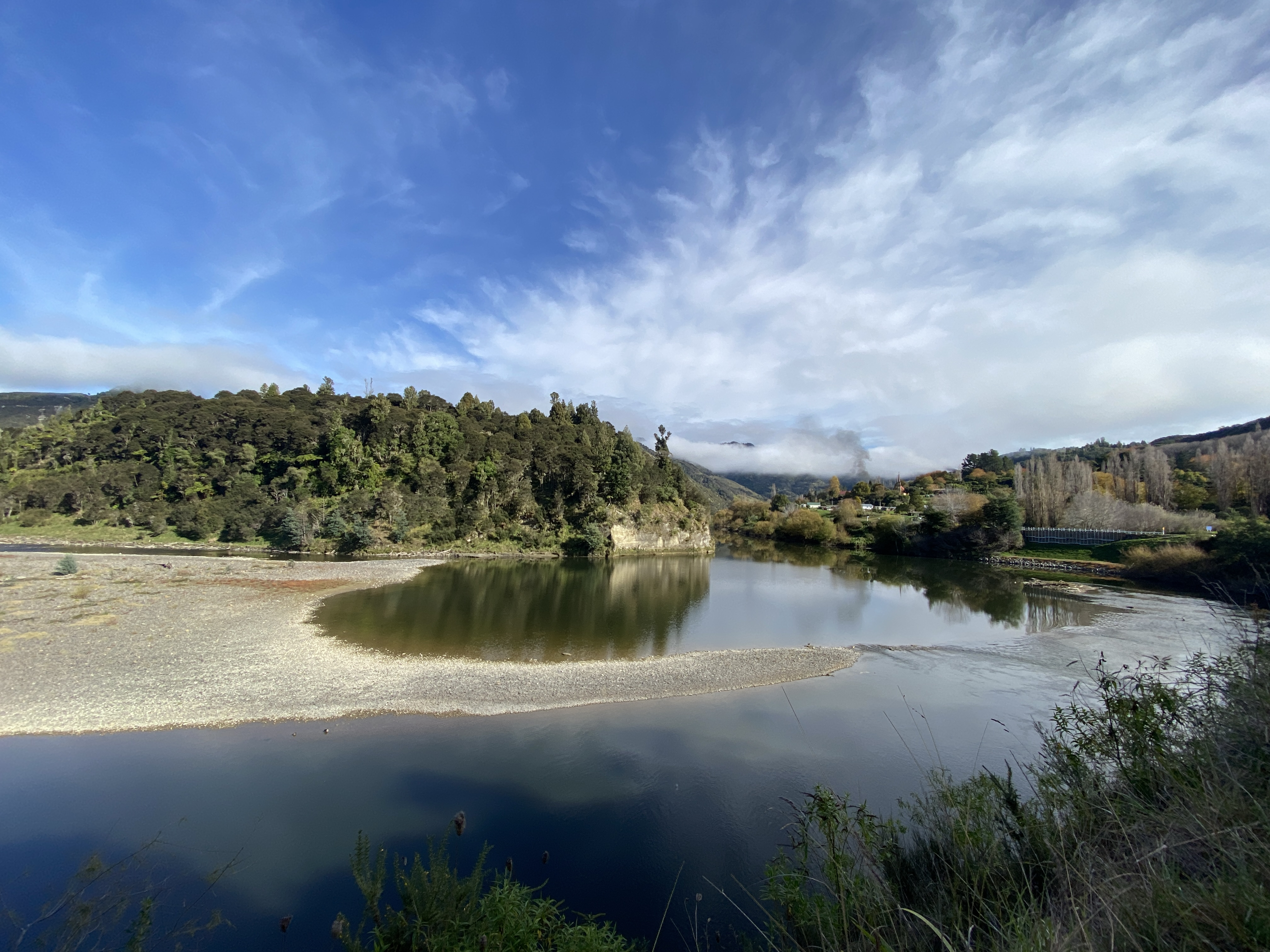 Autumn shadows on the bifurcated river with views to Hiruhārama (Jerusalem). 
Photo / Supplied