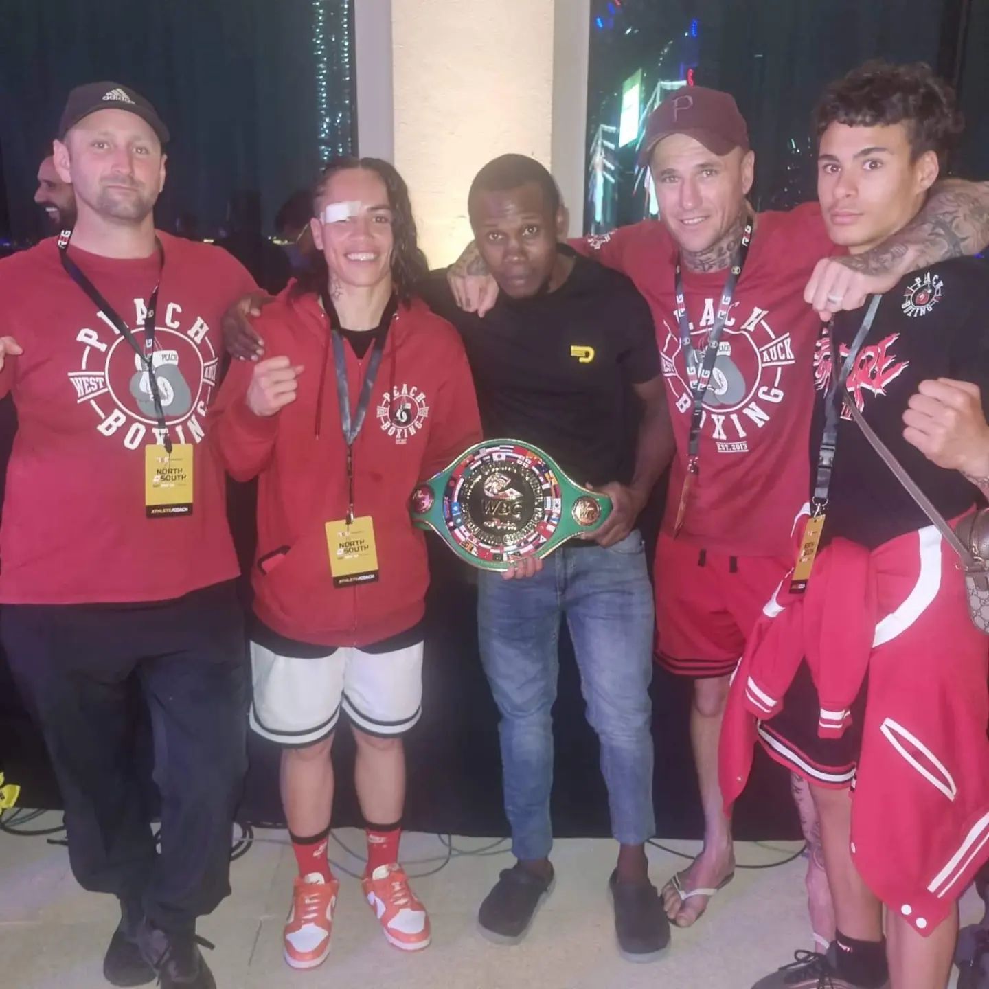 It was smiles all 'round for Mea Motu and her support team after she won the WBC Asia Super Bantamweight title. Photo / Supplied